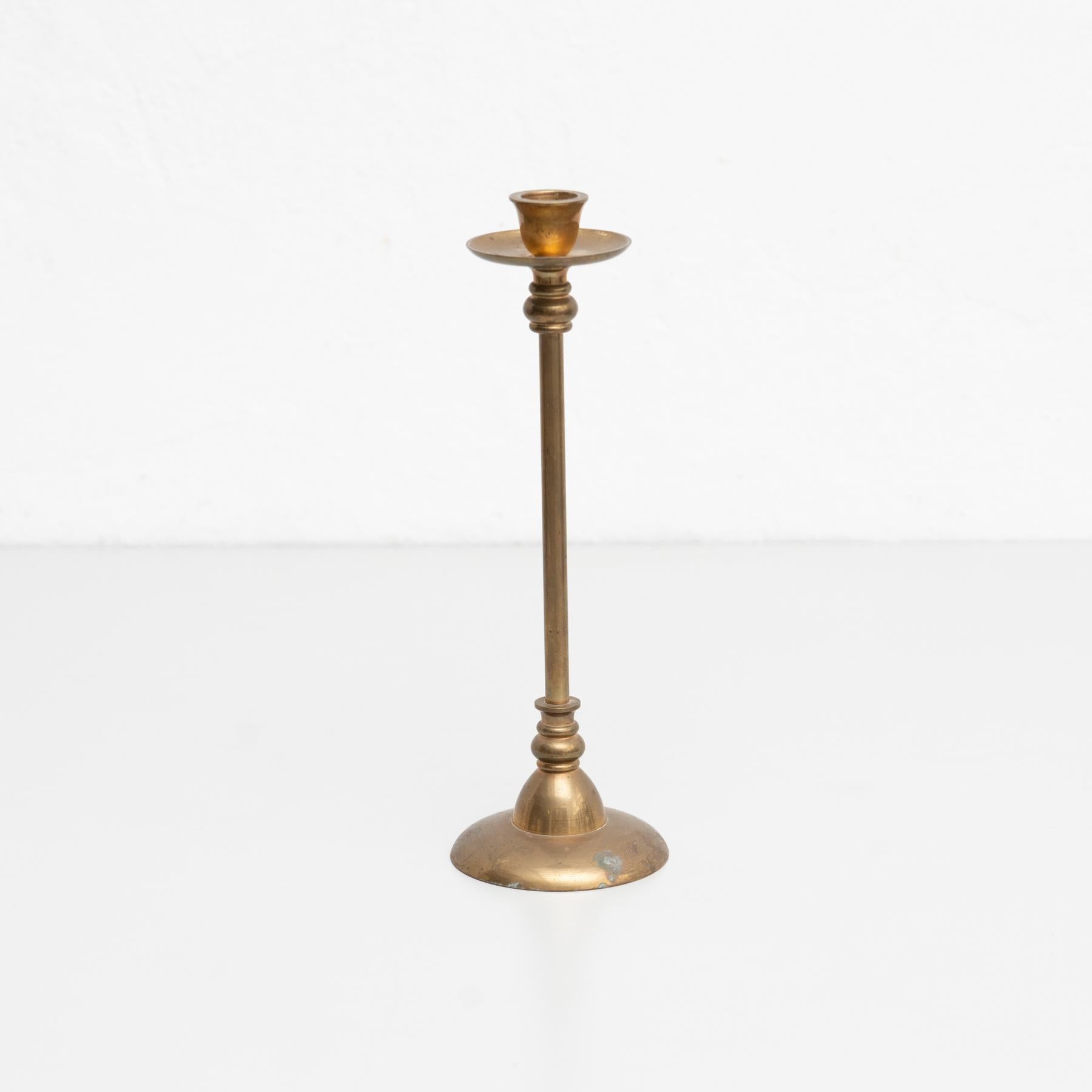 Antique metal candle holder, circa 1950  By unknown manufacturer. Spain    In original condition, with minor wear consistent with age and use, preserving a beautiful patina.      Material:  Metal.     