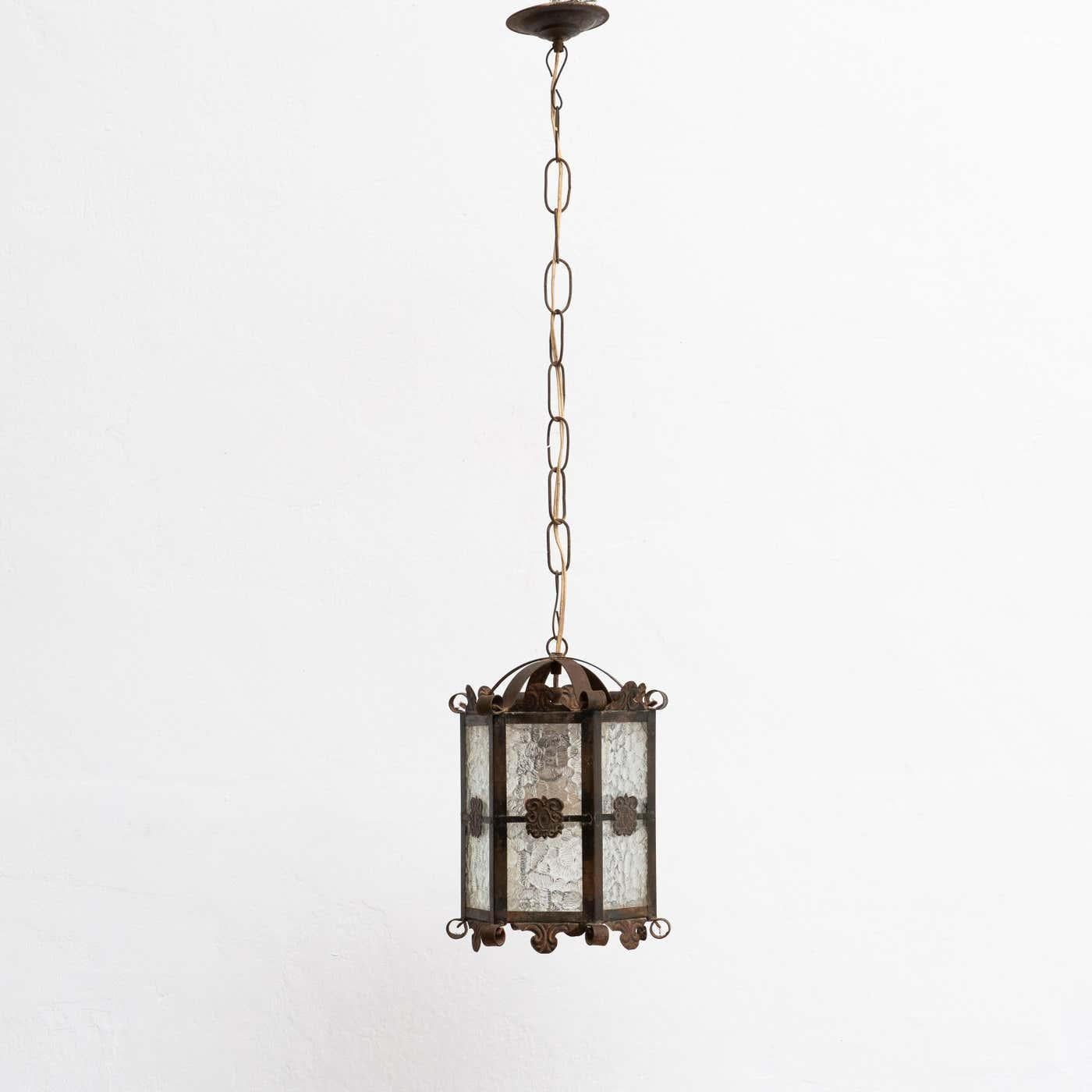 Antique metal ceiling lamp.

By unknown manufacturer, made in circa 1950.

In original condition, with minor wear consistent with age and use, preserving a beautiful patina.

Electrification has not been tested, wired for Europe.

It has some traces