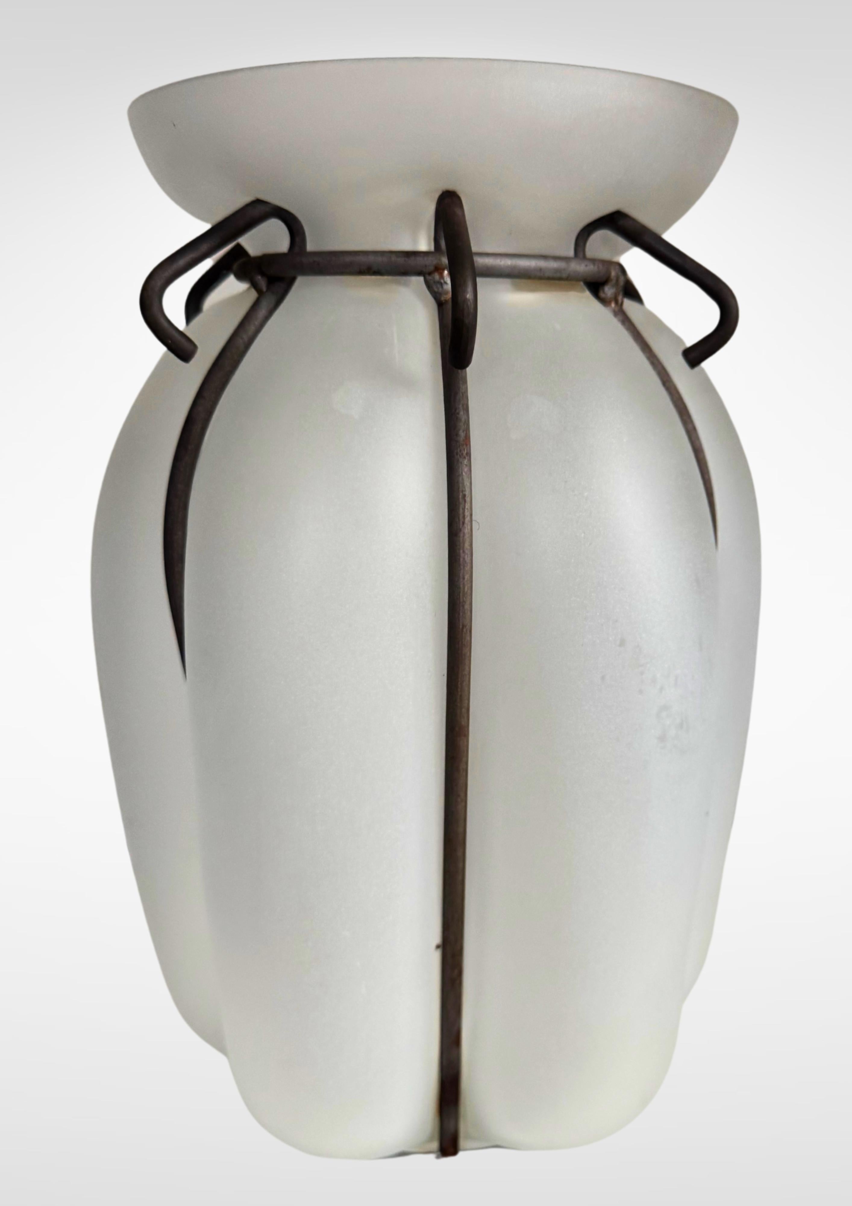Large sized art nouveau caged glass vase by Kralik glasswork.
Frosted clear glass, blown and encased in a metal cage.
In very good vintage condition without damage.
