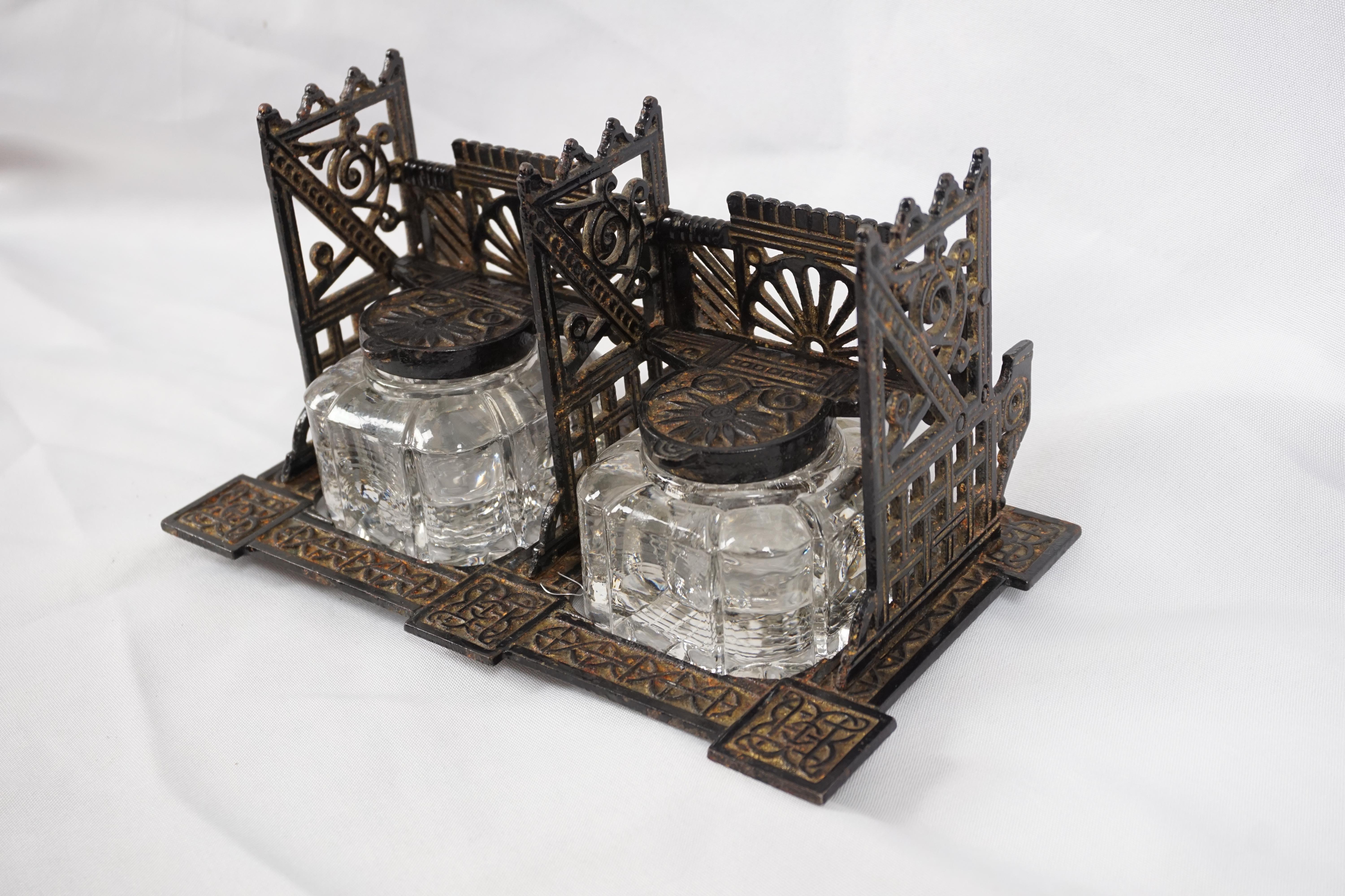 Antique Metal Inkwell, Victorian Double Inkstand, England 1890, H302

England 1890
Metal
Three Quarter Metal Gallery 
Pen Rest To The Back 
Pair Of Glass Inkwells With Tops 
All Sitting In A Carved Metal Base 
Very Solid 

H302

Measures: 8.5