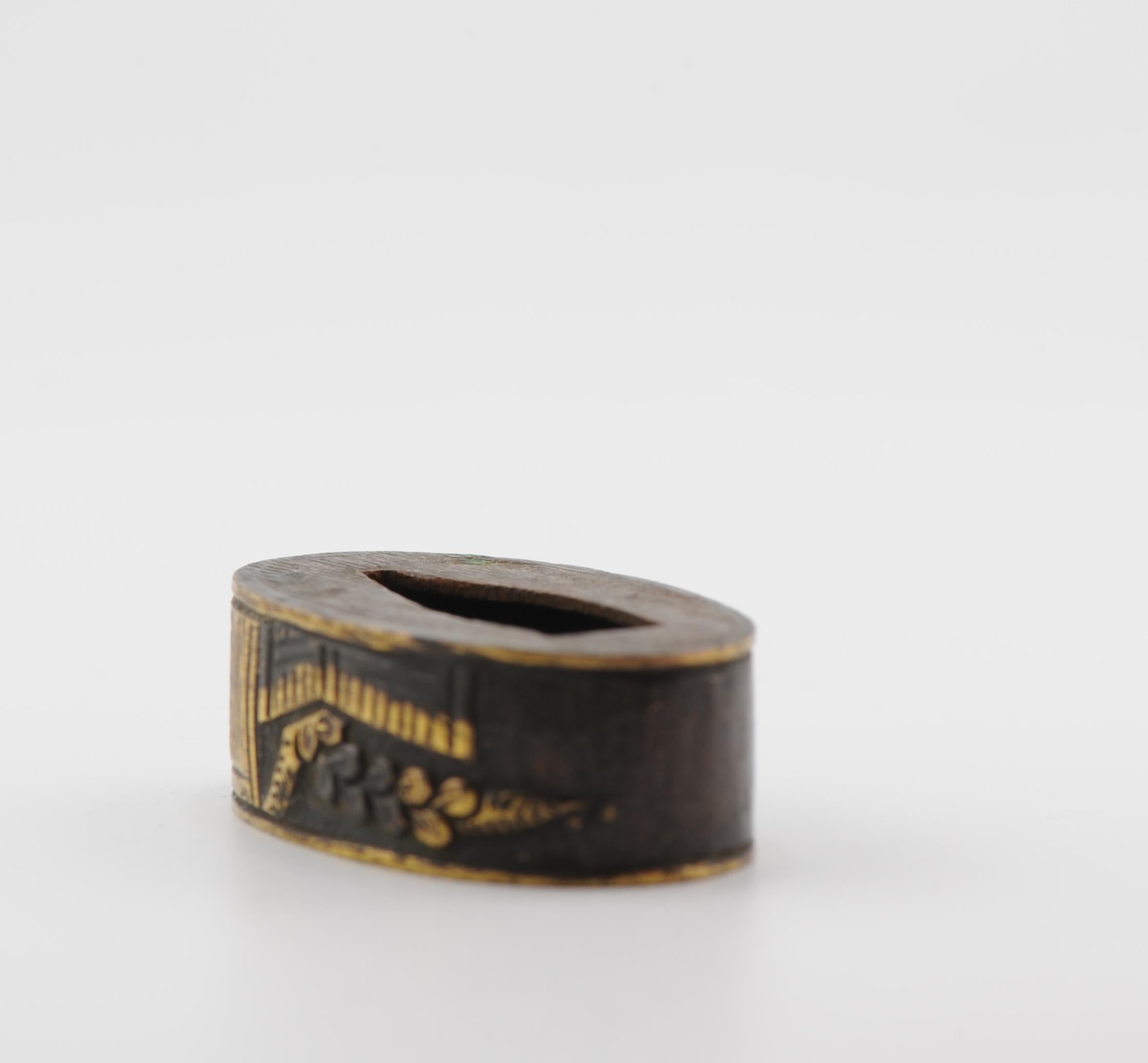 Nicely made Fuchi. The piece is unmarked. Dating to the Edo period

Provenance: Collected in the 1920's. Thence by decent

A fuchi is a collar that is mounted at the base of the grip of a sword hilt, usually made as part of a set with a matching