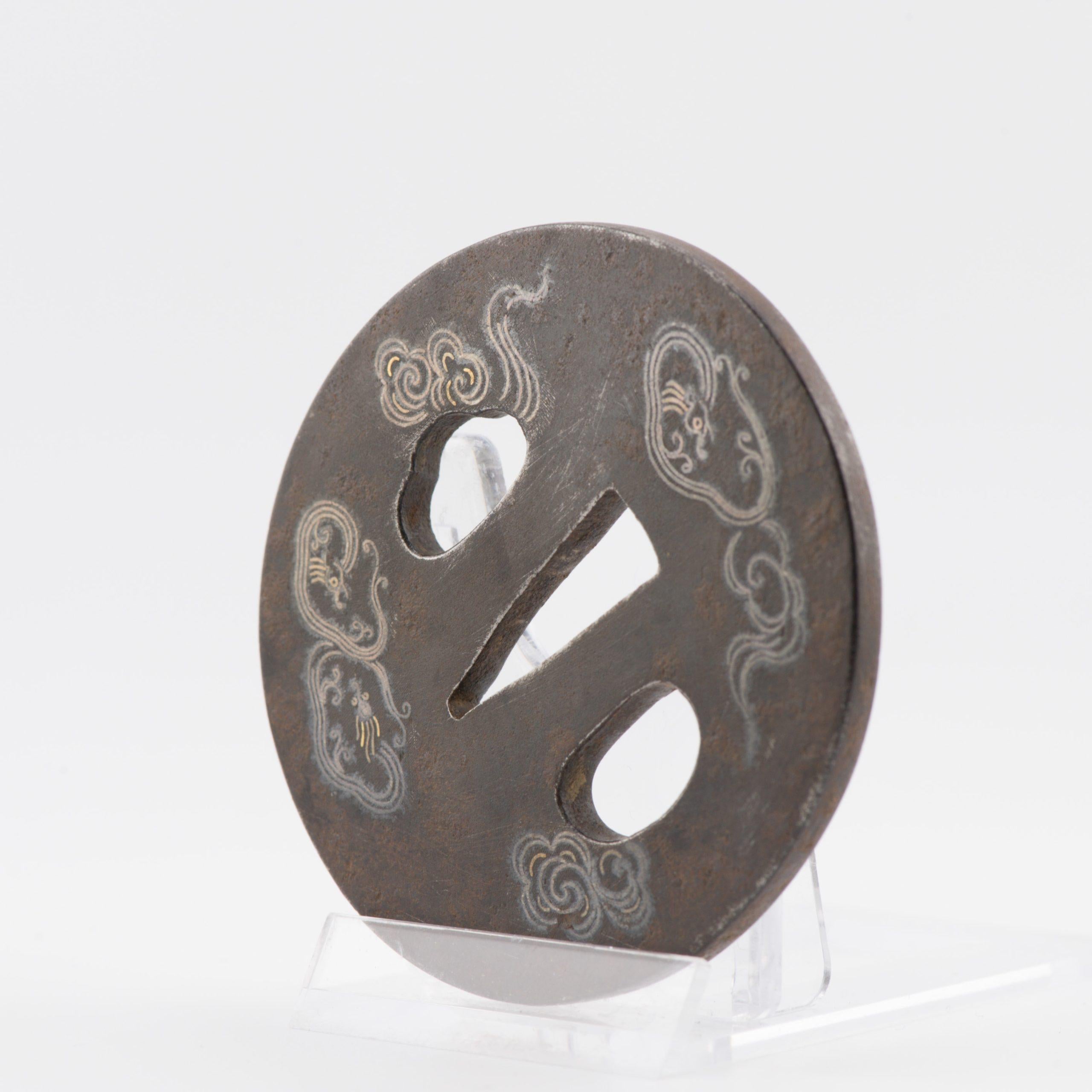 Nicely made Tsuba. The piece is unmarked. Dating to the Edo period

Provenance: Collected in the 1920's. Thence by decent

A Tsuba is a Japanese sword mountings are the various housings and associated fittings (tosogu) that hold the blade of a