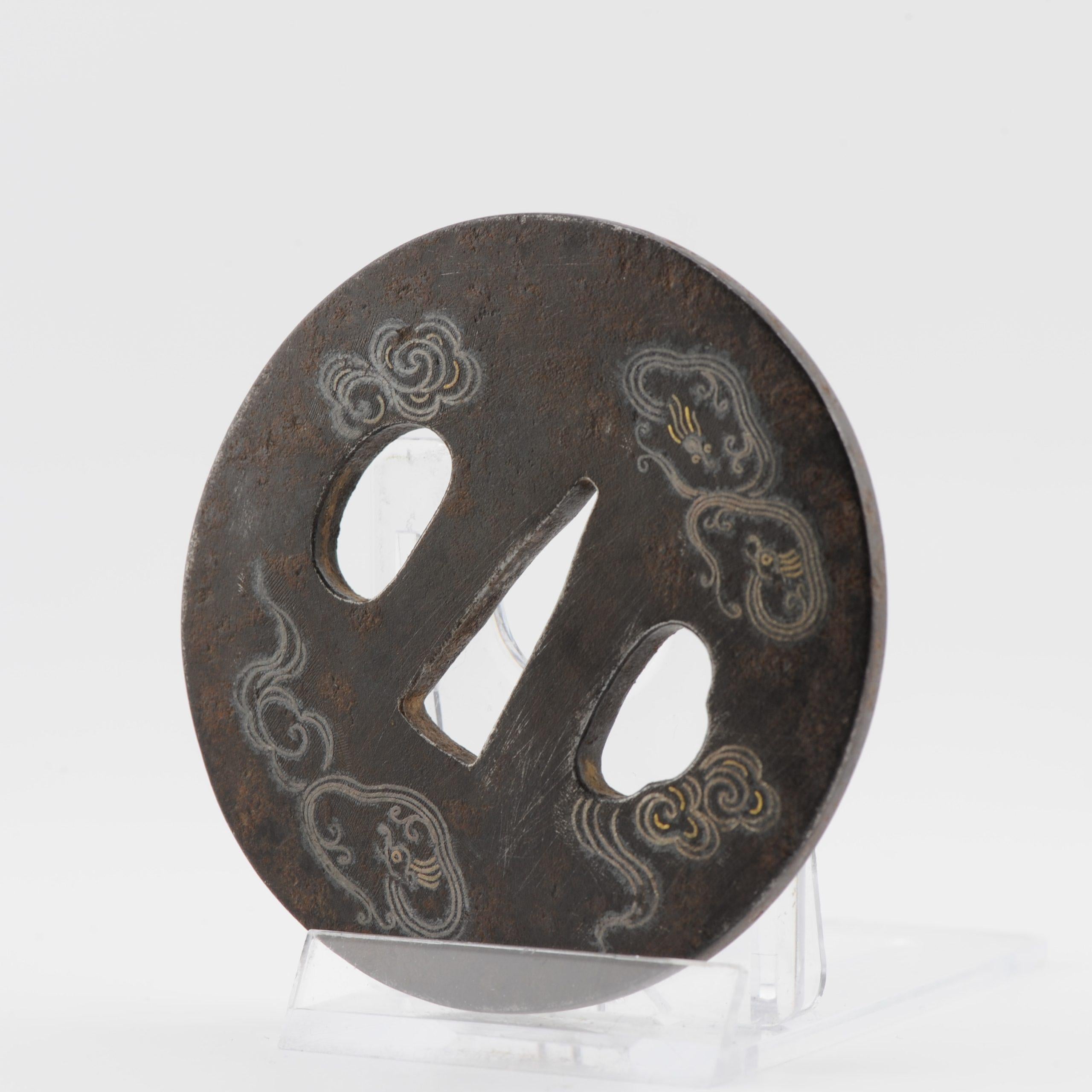 Antique Metal Japanese Tsuba Tosogu with Buddhist Clouds in Silver In Excellent Condition For Sale In Amsterdam, Noord Holland
