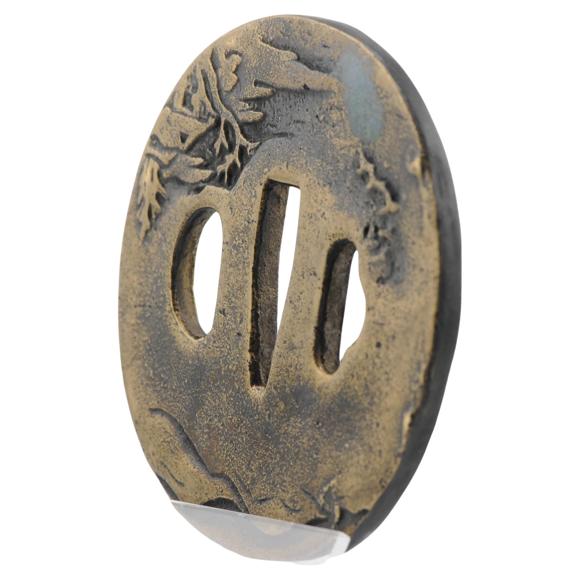 Nicely made Tsuba. The piece is unmarked. Dating to the Edo period

Provenance: Collected in the 1920's. Thence by decent

A Tsuba is a Japanese sword mountings are the various housings and associated fittings (tosogu) that hold the blade of a