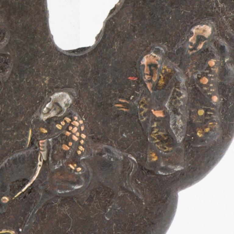 Nicely made Tsuba. The piece is unmarked. Dating to the Edo period

Provenance: Collected in the 1920’s. Thence by decent

A Tsuba is a Japanese sword mountings are the various housings and associated fittings (tosogu)[1] that hold the blade of a