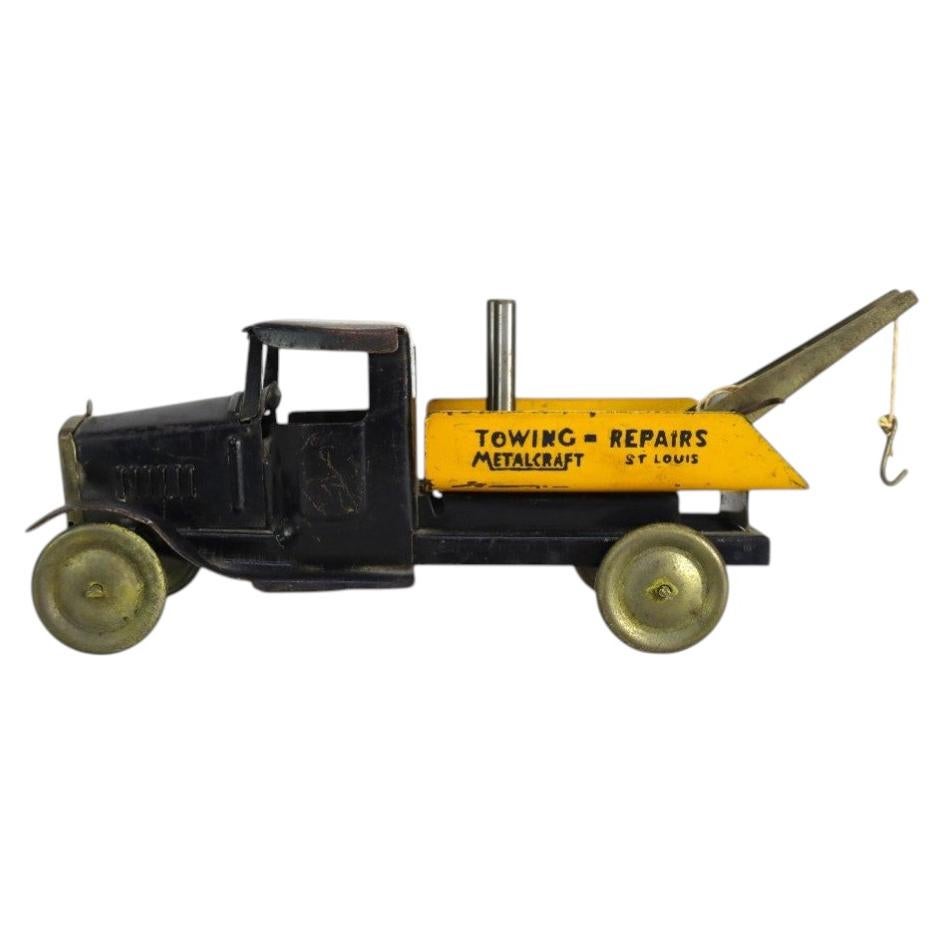 Camion pubblicitario d’epoca in acciaio stampato Steele “Towing & Repairs” della Metalcraft, 1920 circa