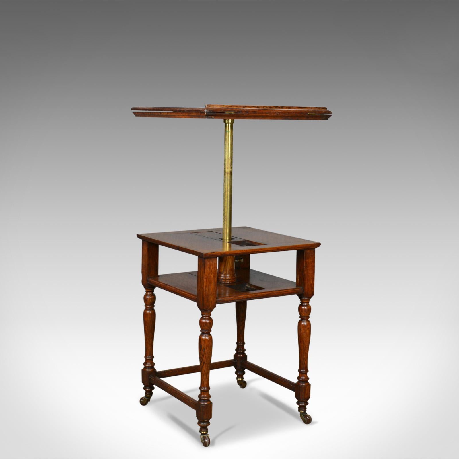 This is an antique metamorphic side table lectern, an English, Victorian, oak library reading table dating to the mid-19th century, circa 1860.

English oak with a deep, warm russet hue
Grain interest, wisps of medullary rays and a desirable aged