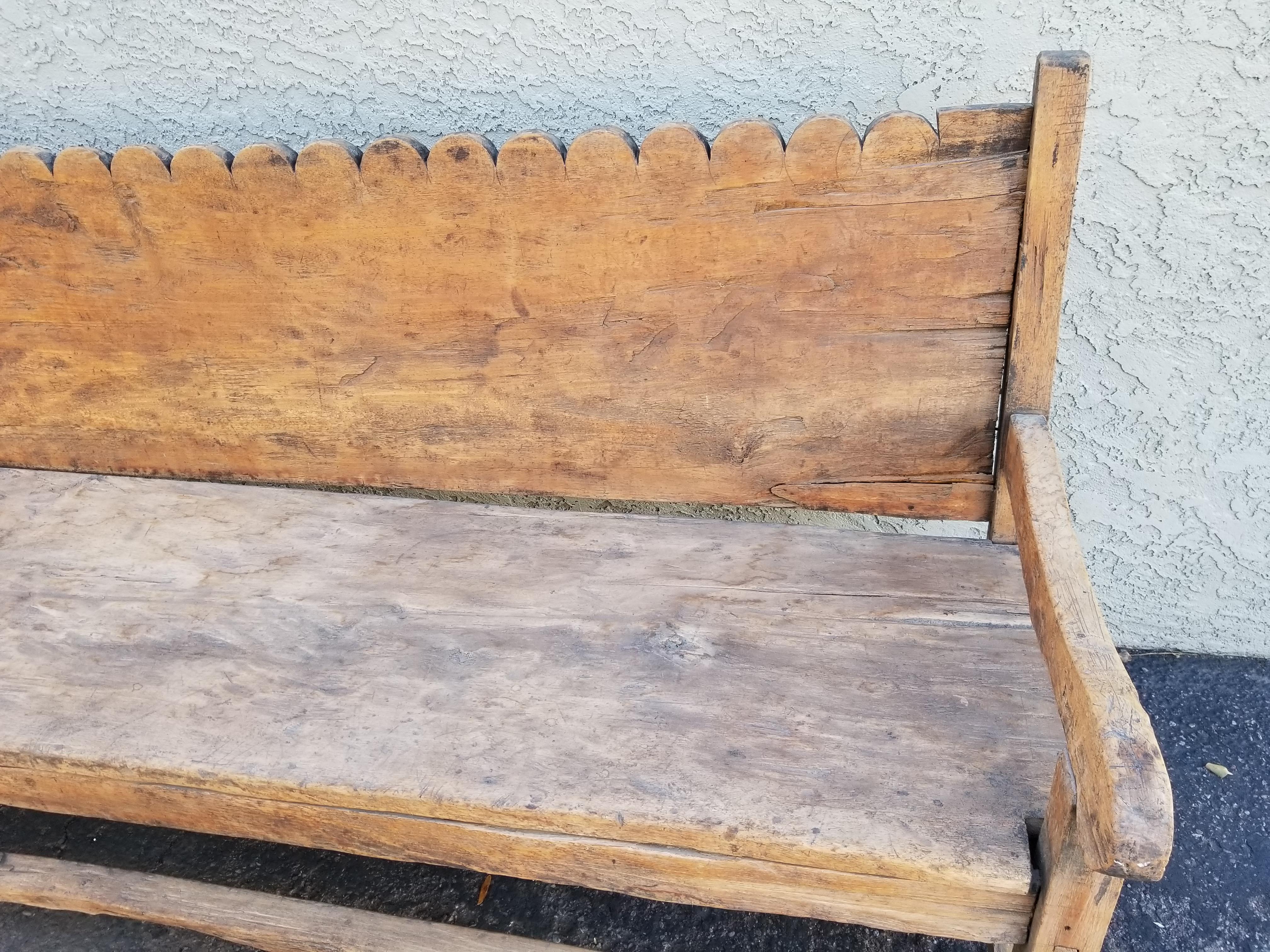 Stunning antique sabino pine bench, with scallop carved back, 19th century Mexican.