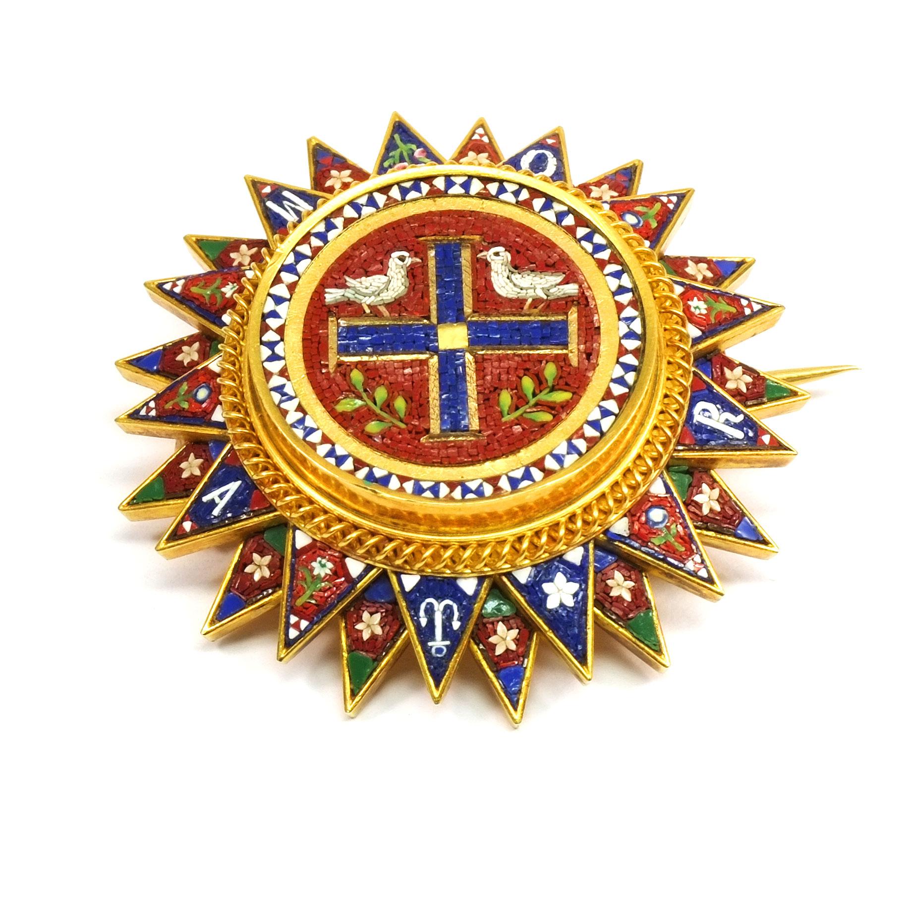 Antique Micromosaic Etruscan Revival Gold Brooch, Rome circa 1860

This antique Italian brooch is finely crafted in 18K gold and designed in the shape of a star. The detailed Micromosaic features a multicolored glass tesserae image of a gold framed
