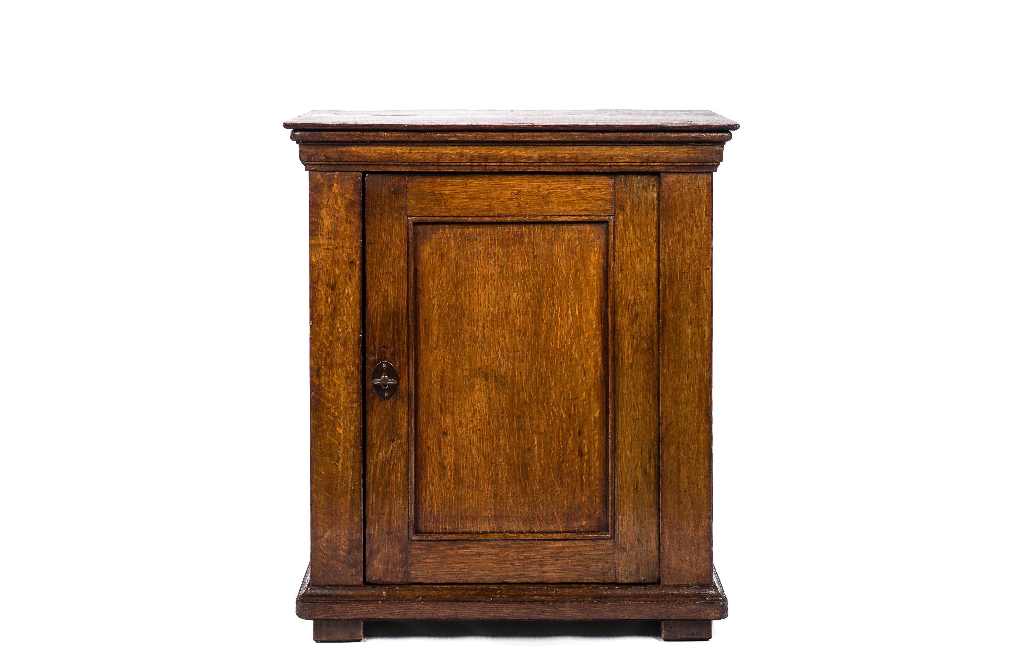 Introducing an exceptional antique Dutch cabinet that epitomizes 18th-century craftsmanship. Dating back to around 1750, this meticulously crafted piece exhibits a warm honey tone, deep gloss, and a distinguished patina, underscoring its historical