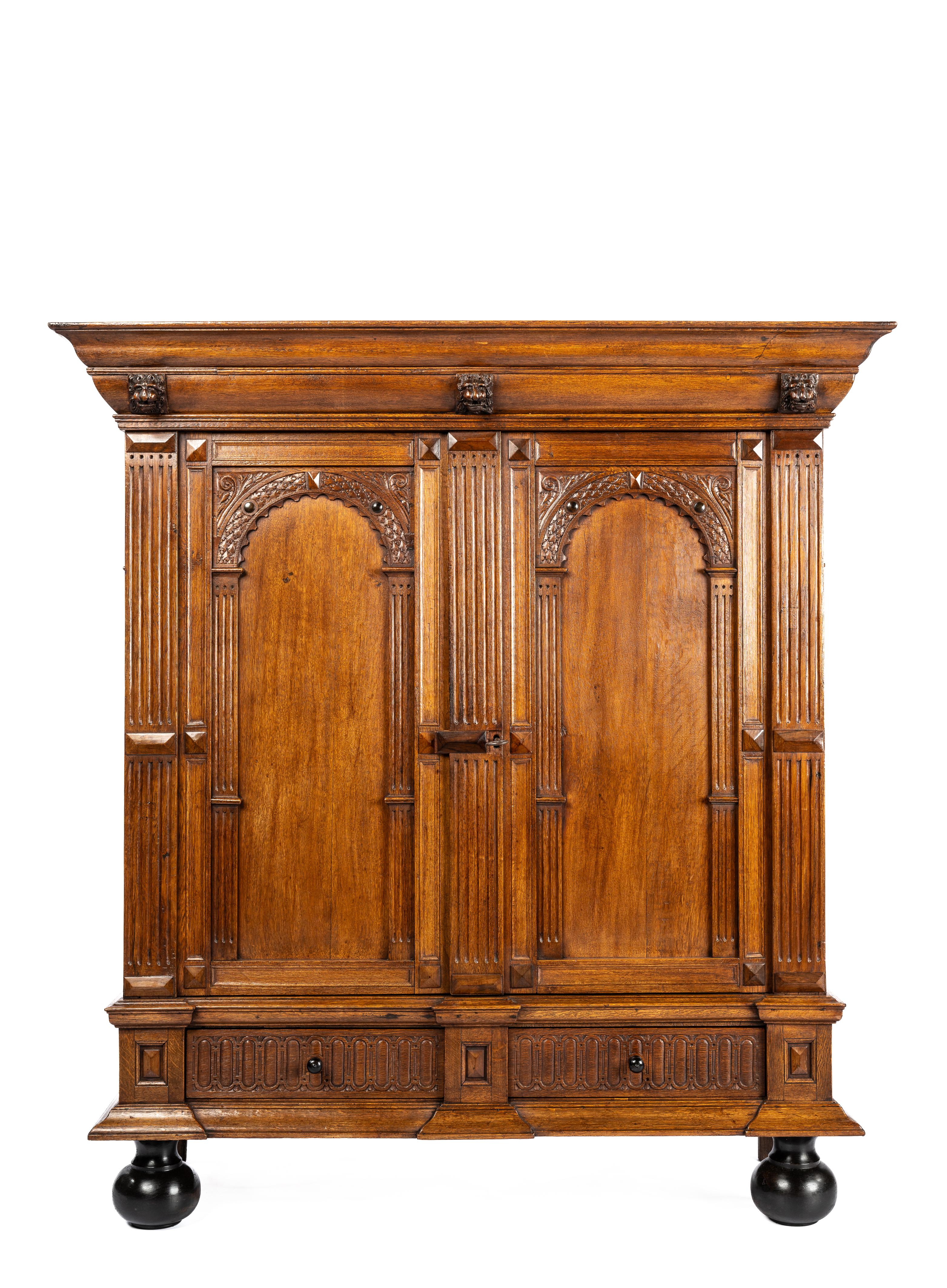 Featured here is an exquisite antique Dutch cupboard crafted from the finest European summer oak, meticulously following the Dutch Renaissance tradition during the 