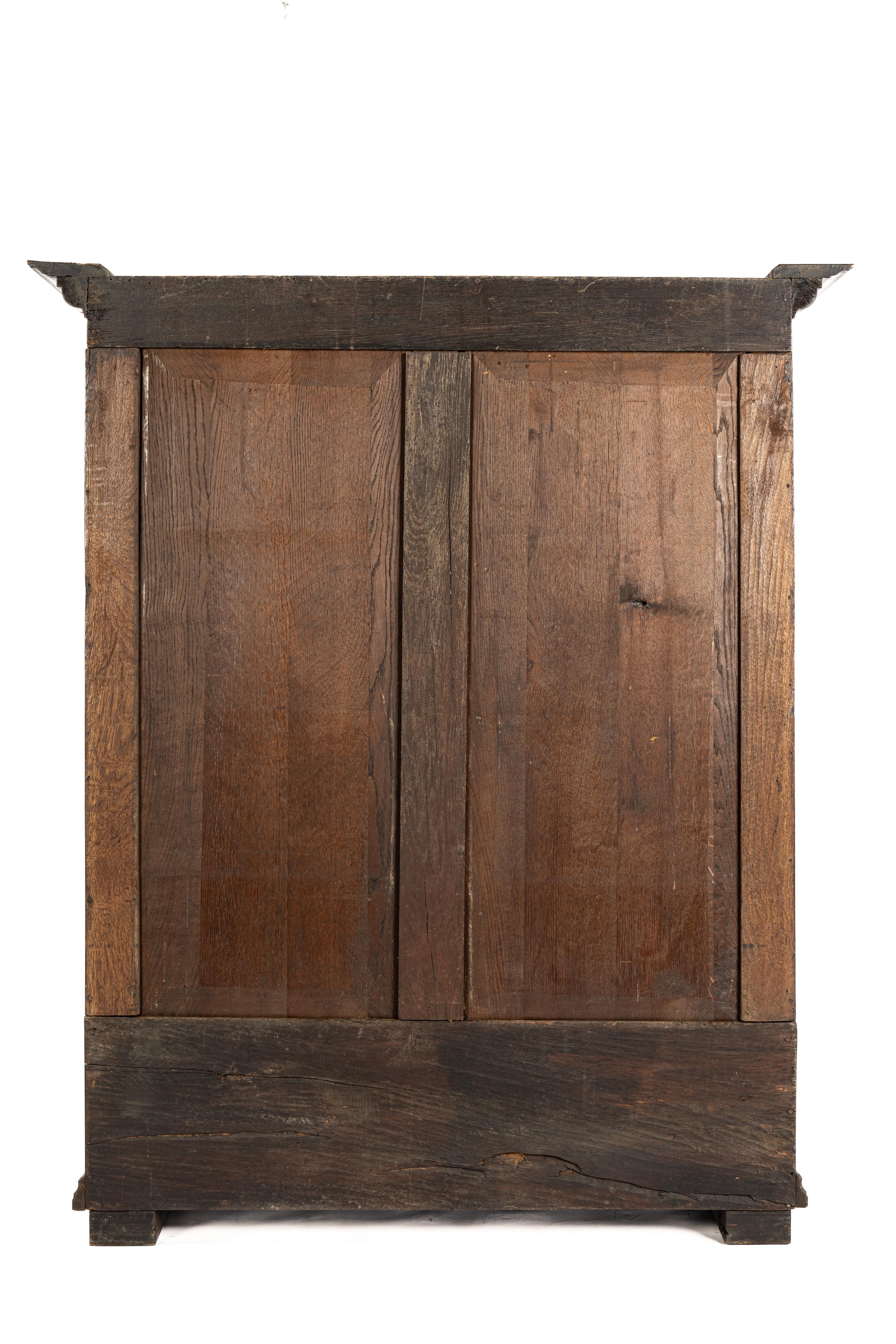 Carved Antique mid 18th century German warm brown two door demountable cabinet For Sale