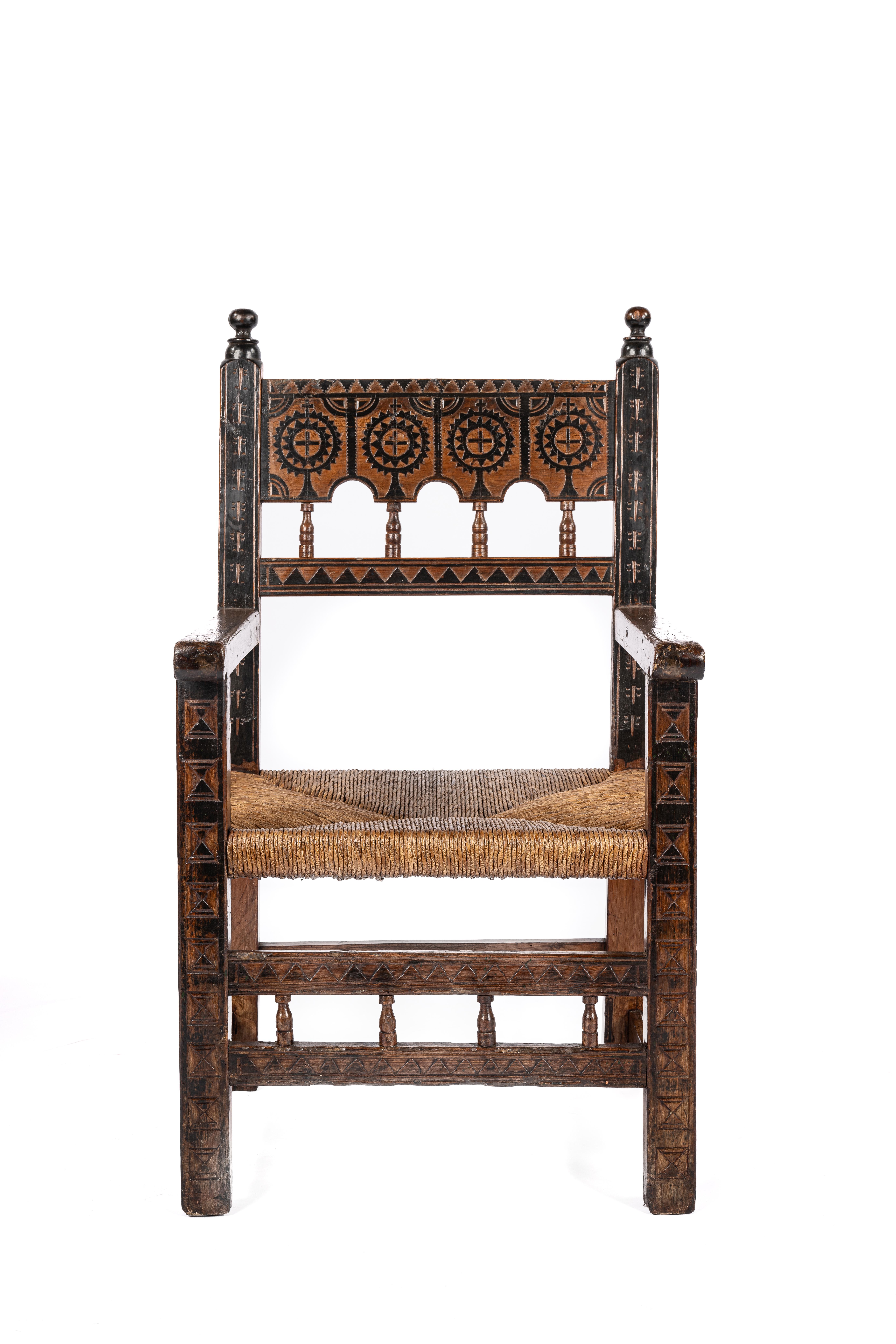 Presenting a magnificent antique Spanish chair, crafted from solid pine wood around 1750. This chair is a substantial piece, reflecting the high status of its original owner and indicating that it came from a distinguished household. Its large,