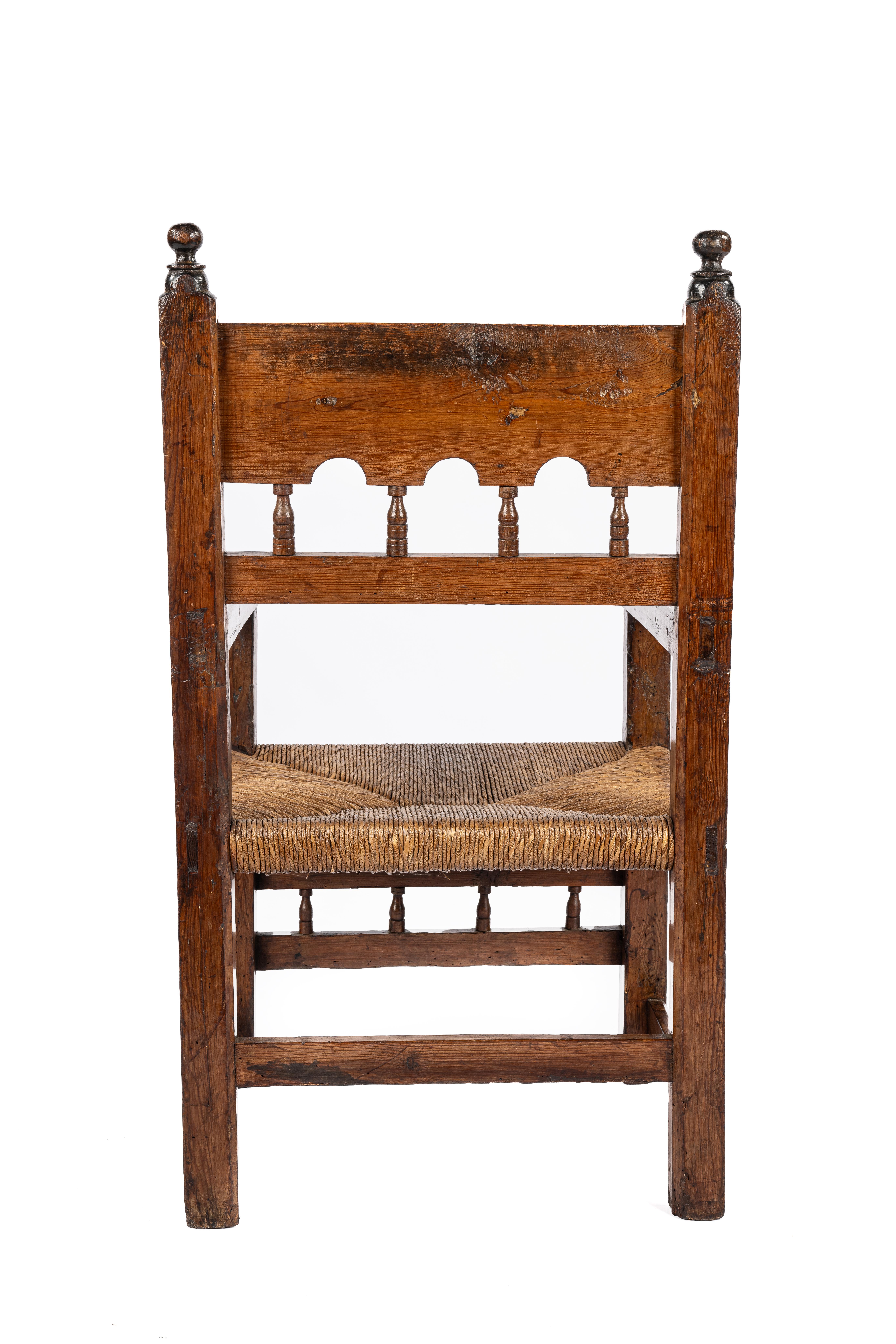 Blackened Antique mid 18th Century Large Spanish Pinewood Carved Arm chair or Fauteuil For Sale