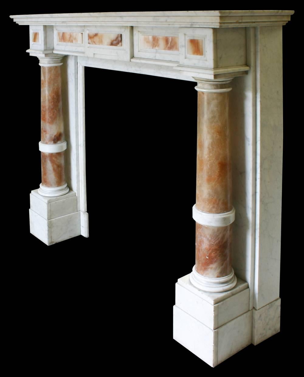 Mid-19th century continental Carrara marble fire surround, the substantial alabaster pillars support the box frieze which is decorated with alabaster mounts and is in turn surmounted by the heavily moulded shelf, circa 1870.
Images prior to