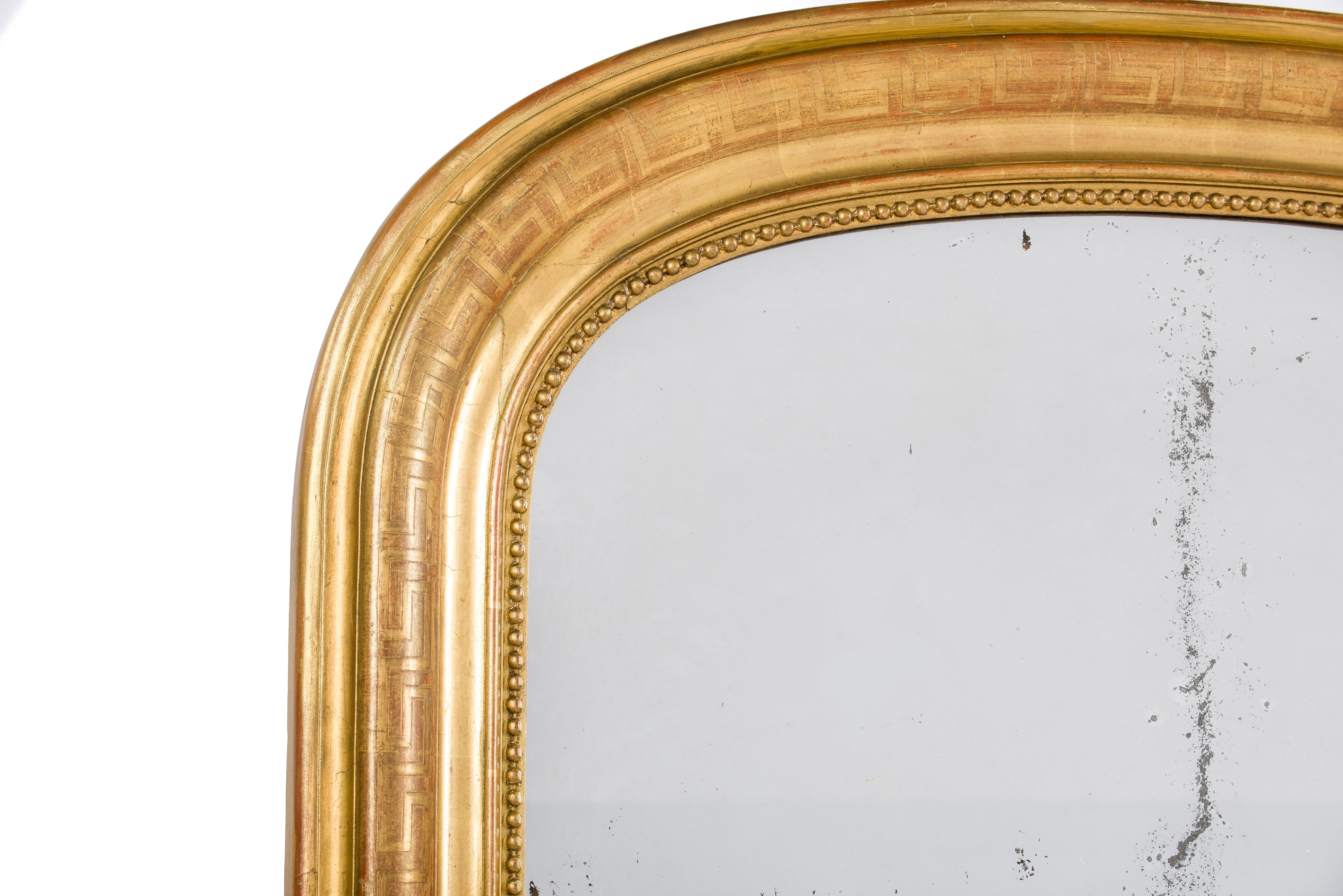 antique gold arched mirror