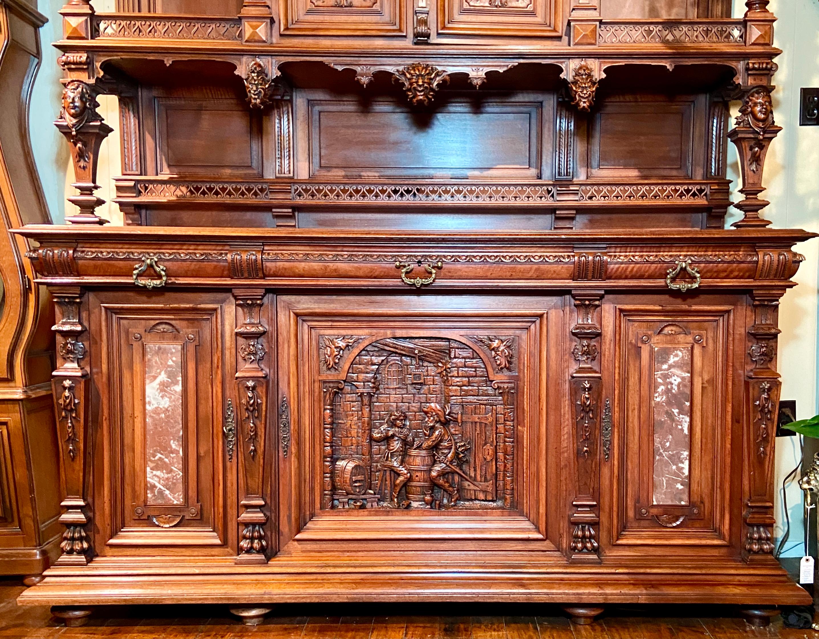 Antique mid 19th century French premier exceptionally carved walnut vesalier cabinet.
