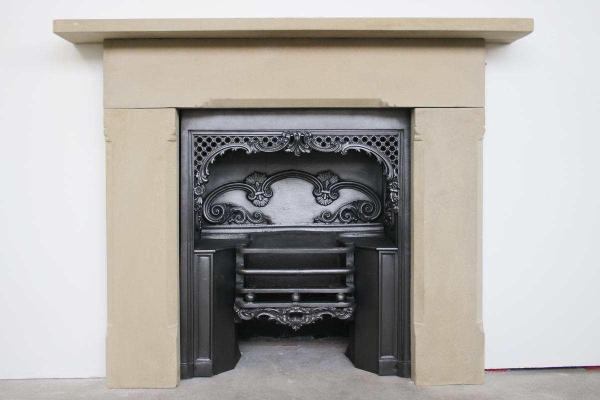 Antique mid 19th Century sandstone fireplace surround of good colour and simple form. Circa 1850.

Pictured with an early 19th Century grate, sold separately.

For detailed sizes please see the size diagram in the image gallery.