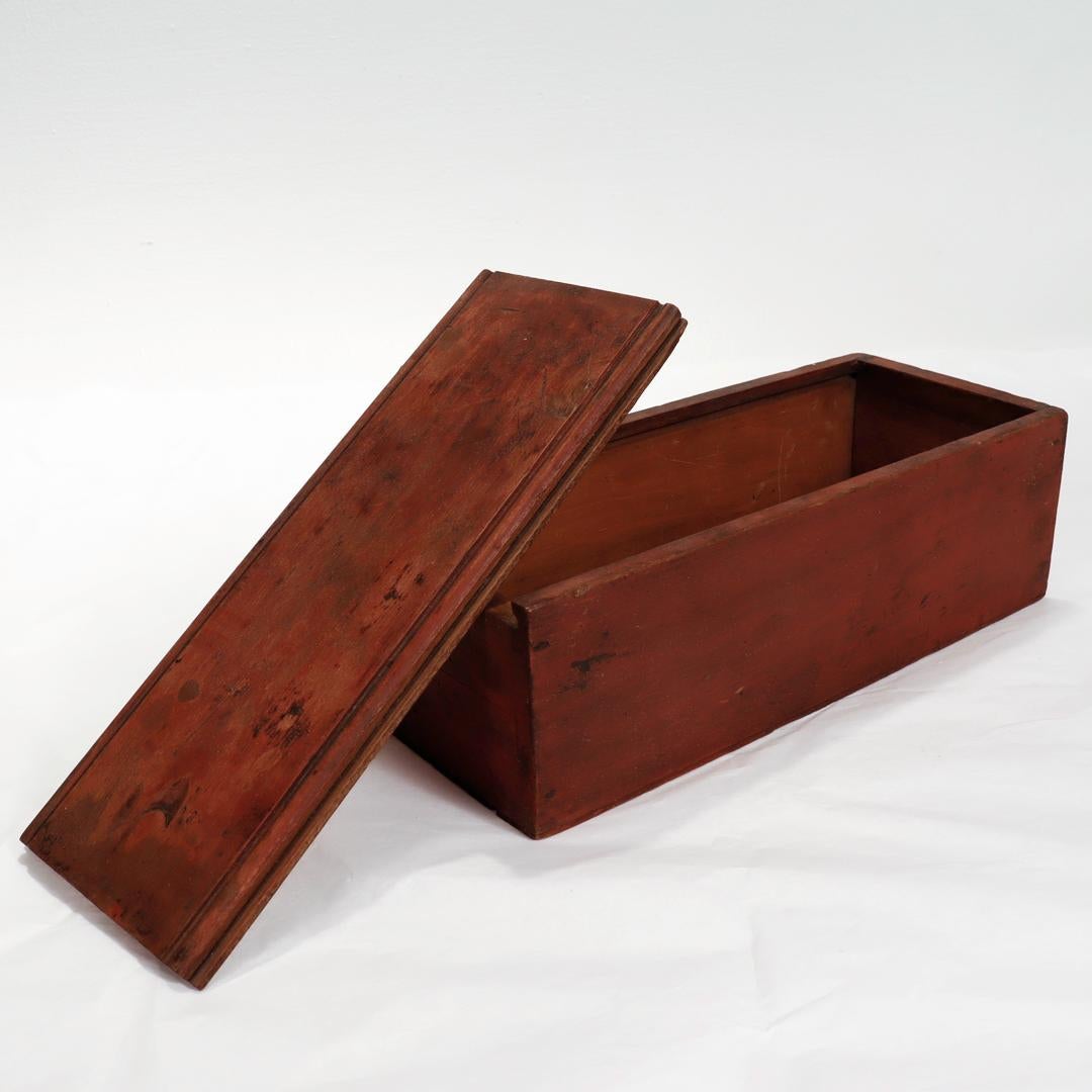 American Antique Mid-Atlantic States Folky Slide Lid Candle Box with an Original Red Wash For Sale