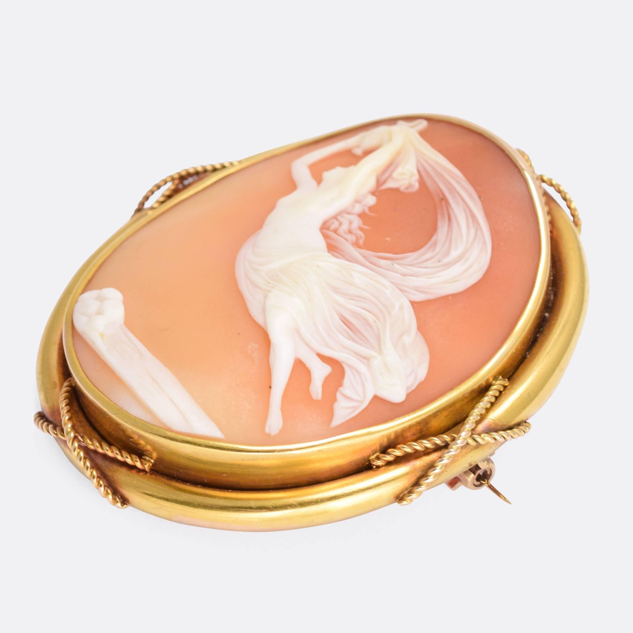 An especially beautiful shell cameo brooch dating from the mid-19th Century. The subject is the Greek goddess Iris, the personification of the rainbow and messenger of the gods. More specifically, it is a re-imagination of the 1793 painting 