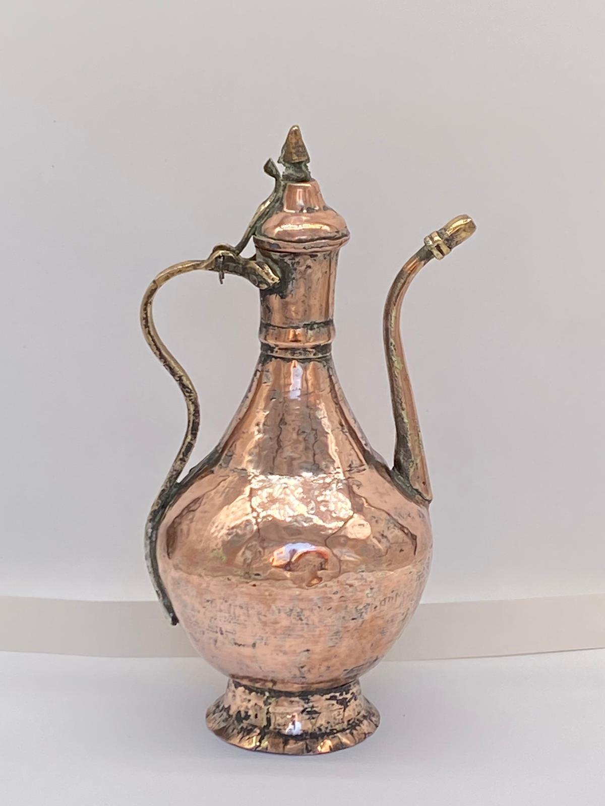19th Century antique Middle Eastern copper coffee pot, beautifully shaped. Good original antique condition.
