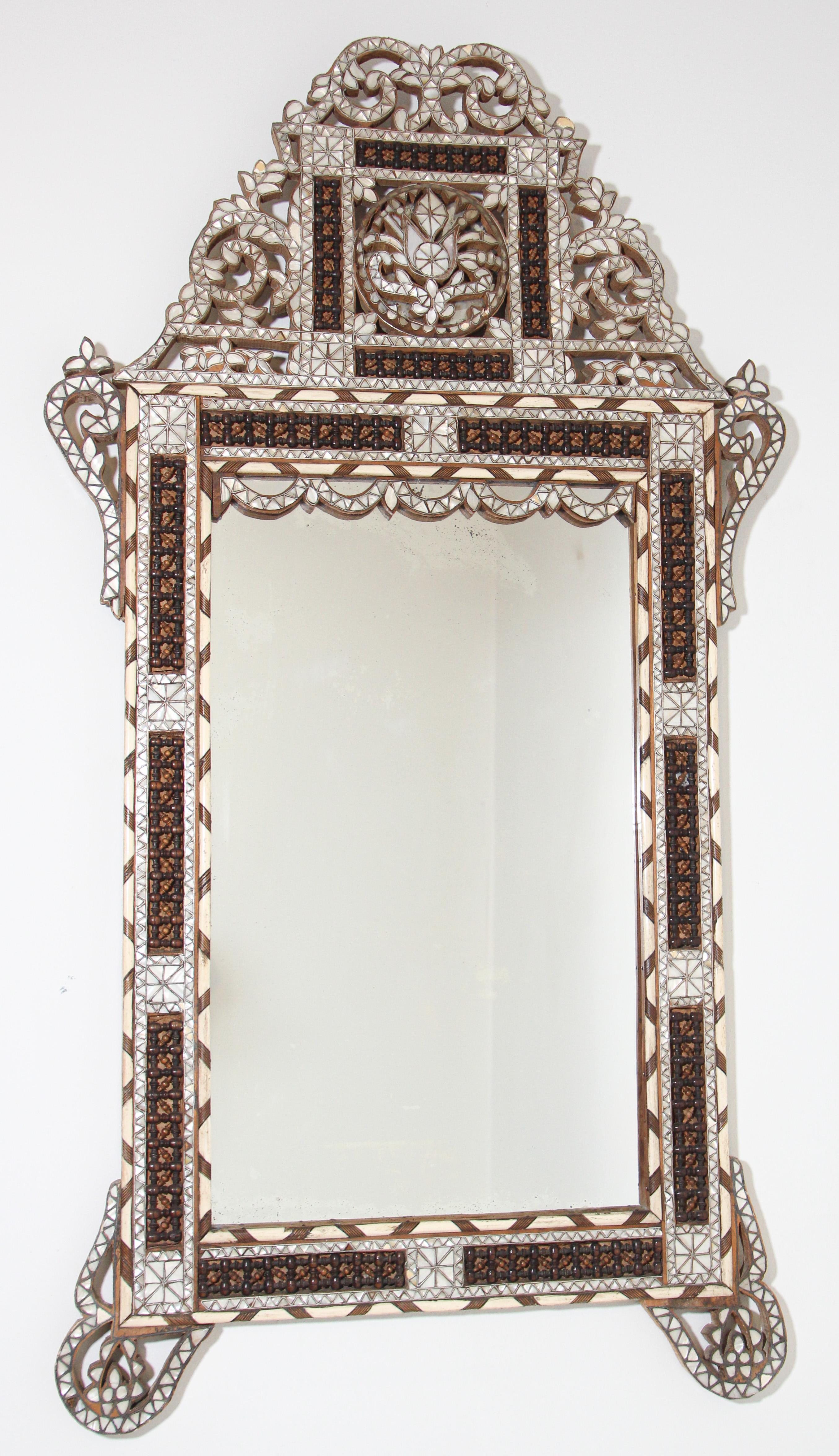 Antique Middle Eastern Moorish white mother of pearl inlaid antique mirror, late 19th century.
Antique Middle Eastern Moorish mirror in the Turkish, Syrian ottoman style.
Sensational large Levantine finely inlaid with mother of pearl, each piece of