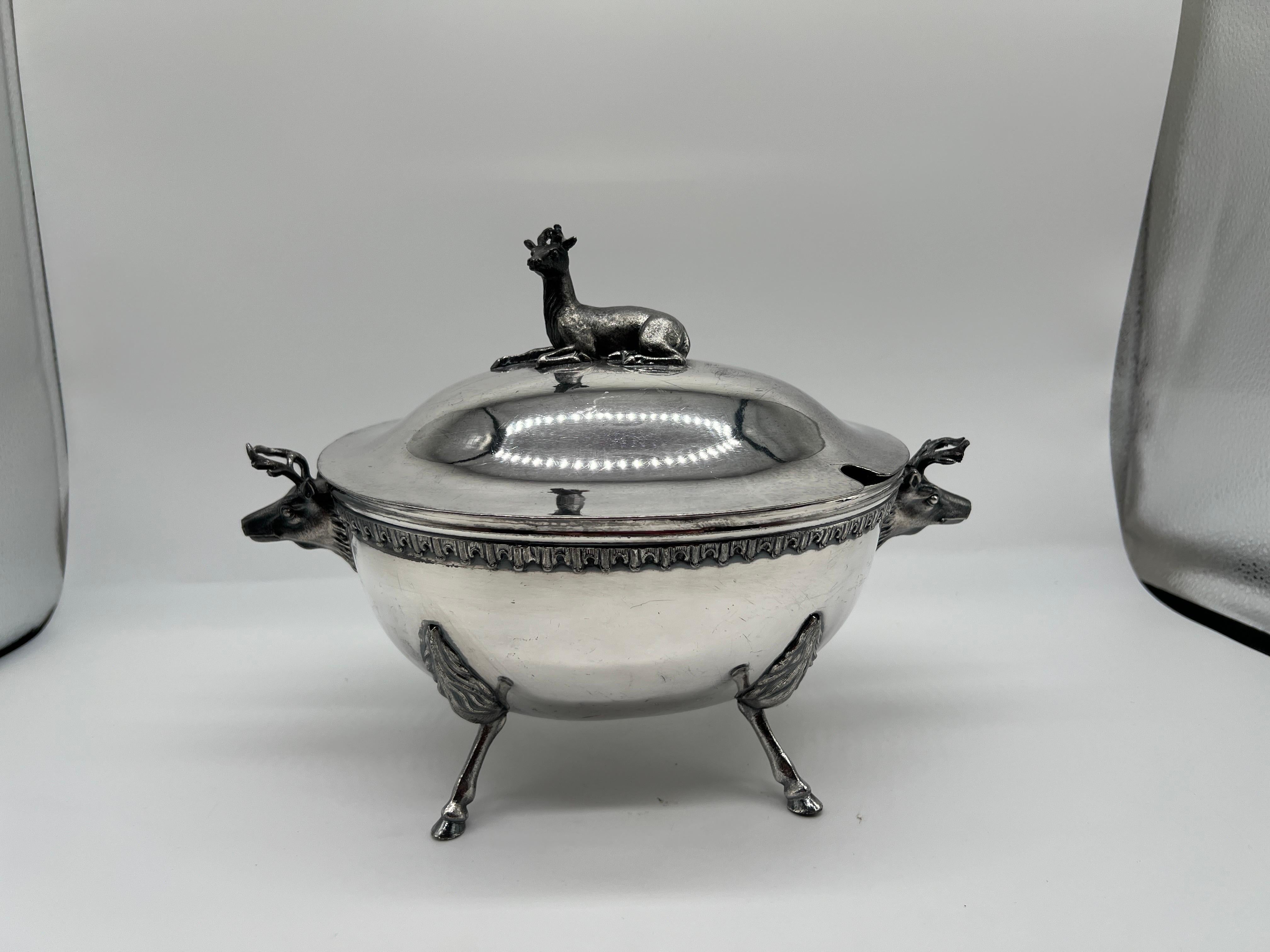 Middletown Plate Company (English, founded in 1864), 19th century. An antique silverplated tureen in two parts with two stag form handles, resting deer finial to the lid and resting on four hoof feet. Marked appropriately to underside.