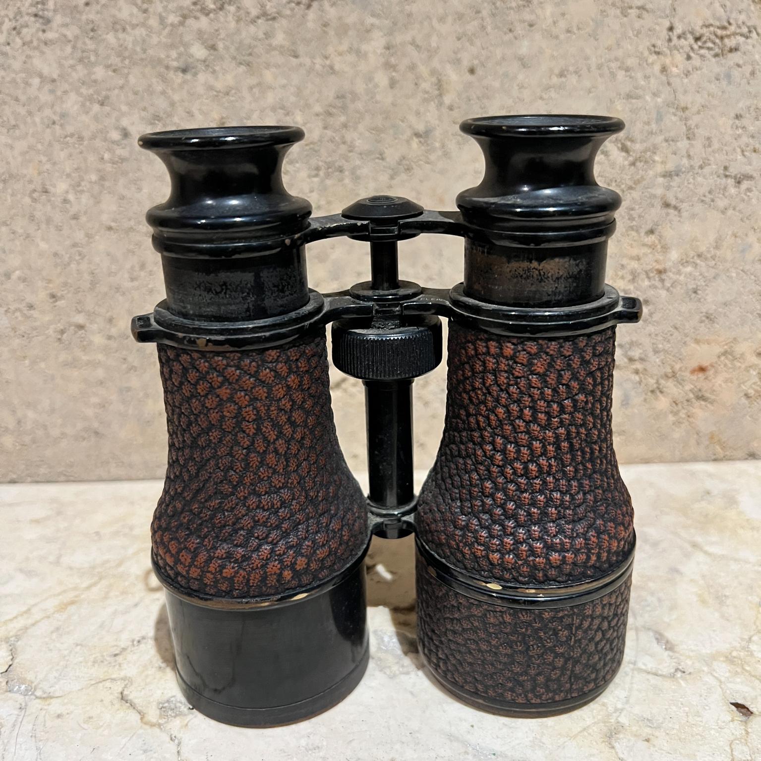 AMBIANIC presents
Antique Militaria Field Glasses Binoculars
5.25 W x 2.25 D x 6.25 H
unsigned
Metal Glass
Preowned vintage condition
Refer to images