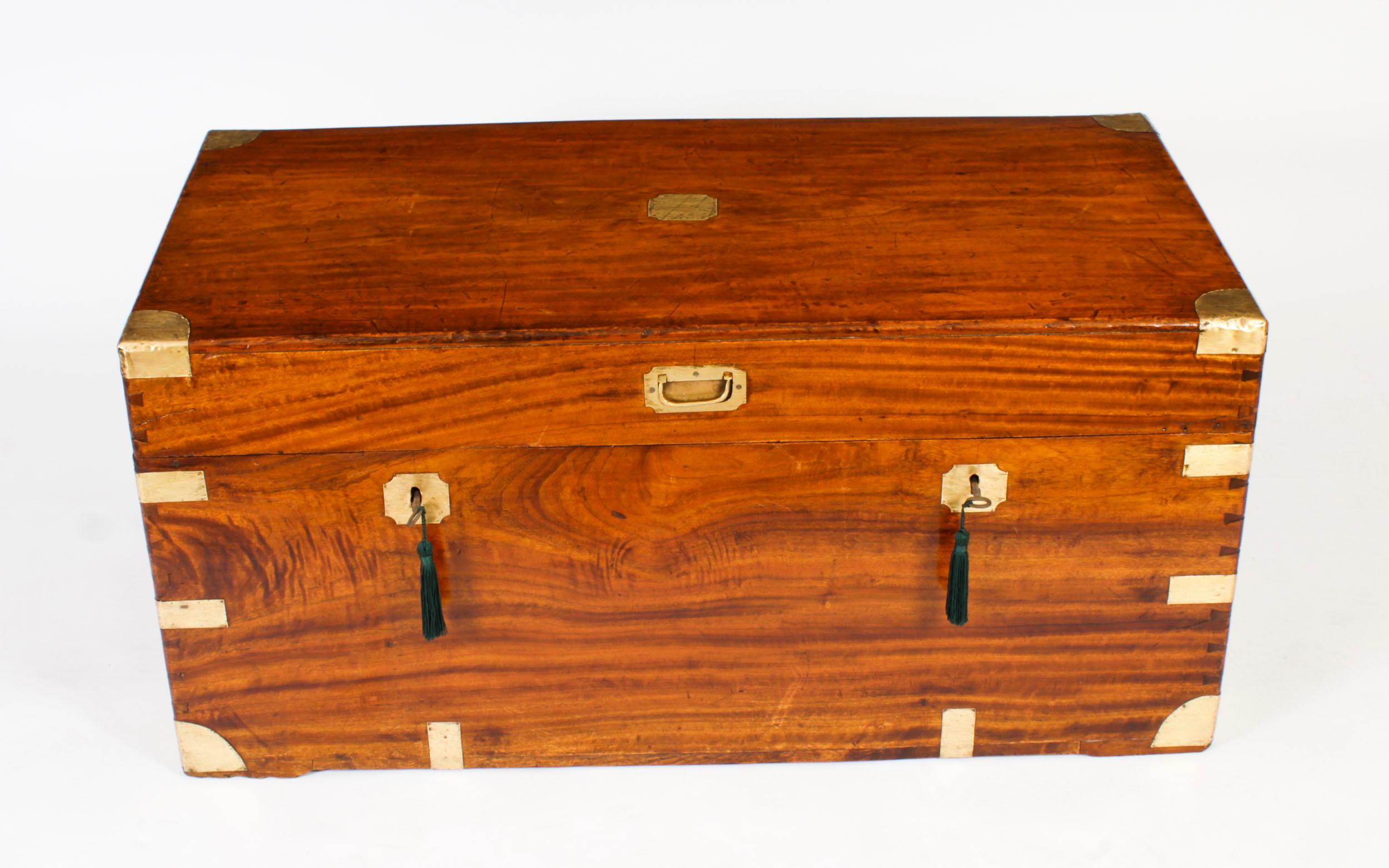 This is beautifully crafted antique Georgian camphorwood military campaign trunk or coffer, ideal for use as a coffee table, circa 1820 in date.

This antique trunk is made from the finest quality camphorwood which has a beautiful grain and scent.
