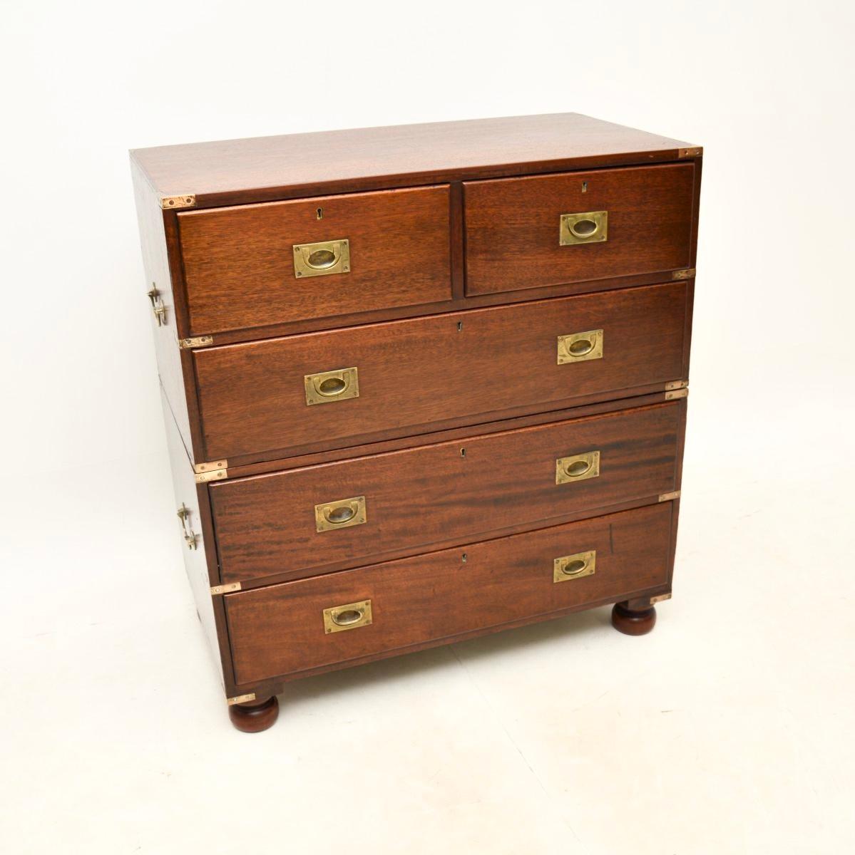 A smart and very well made antique military campaign chest of drawers. This was made in England, it dates from around the 1920-30’s.

It is of superb quality and is a great size, the top half lifts off the bottom half for ease of transport. The wood