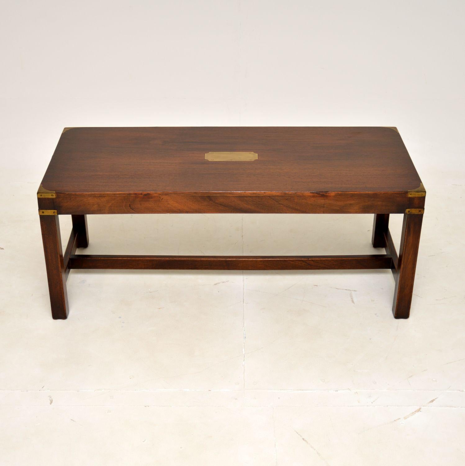 A superb antique coffee table in the military campaign style. This was made in England, it dates from around the 1930’s.

The quality is outstanding, this is very well built and has a very smart design. The wood has a beautiful colour tone, it is