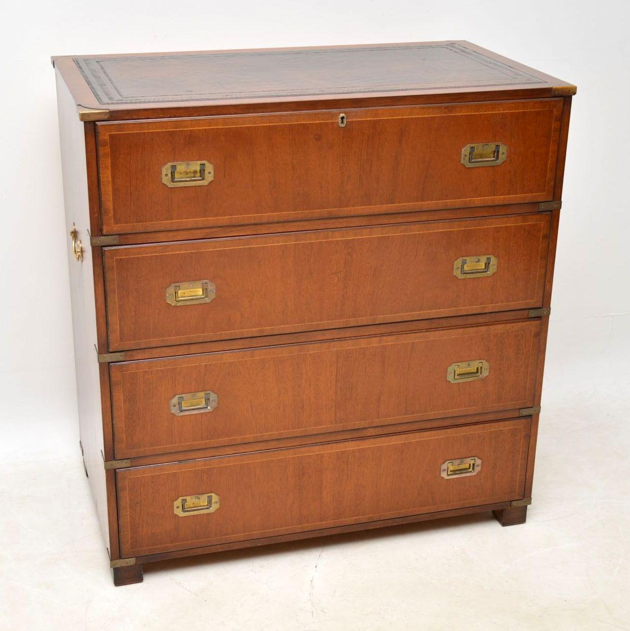 Right now there are a matching pair of bedside chests on the site to go with this piece & they would all go well together in the same room. This mahogany secrétaire chest of drawers is antique military style & dates from circa 1950s period. The
