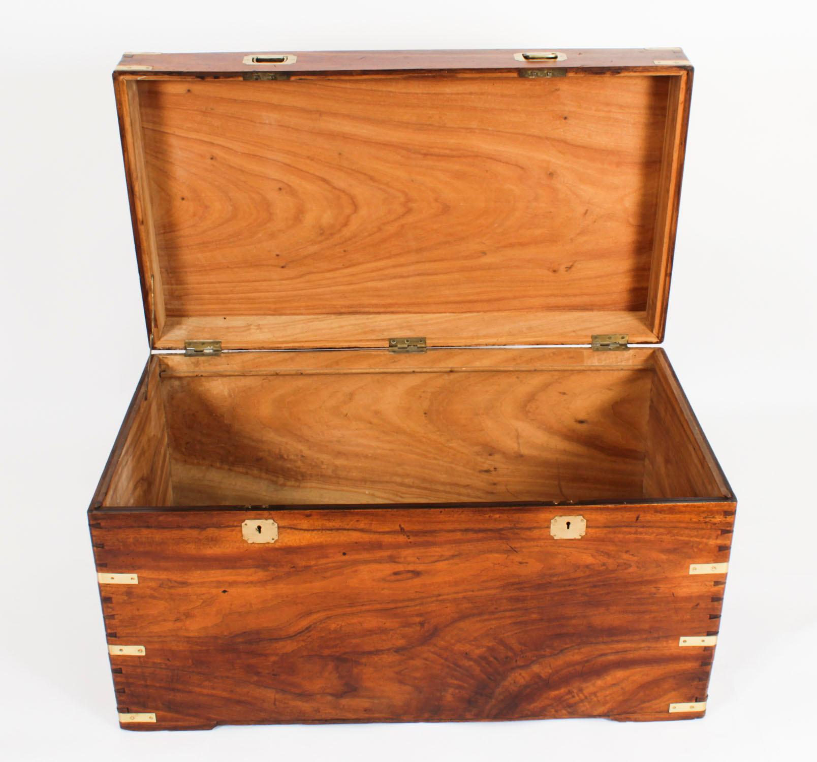 This is beautifully crafted antique Victorian camphorwood military trunk or coffer, circa 1860 in date.

With a rectangular hinged lid and side carrying handles there is no mistaking its unique design and superb quality, which is certain to attract