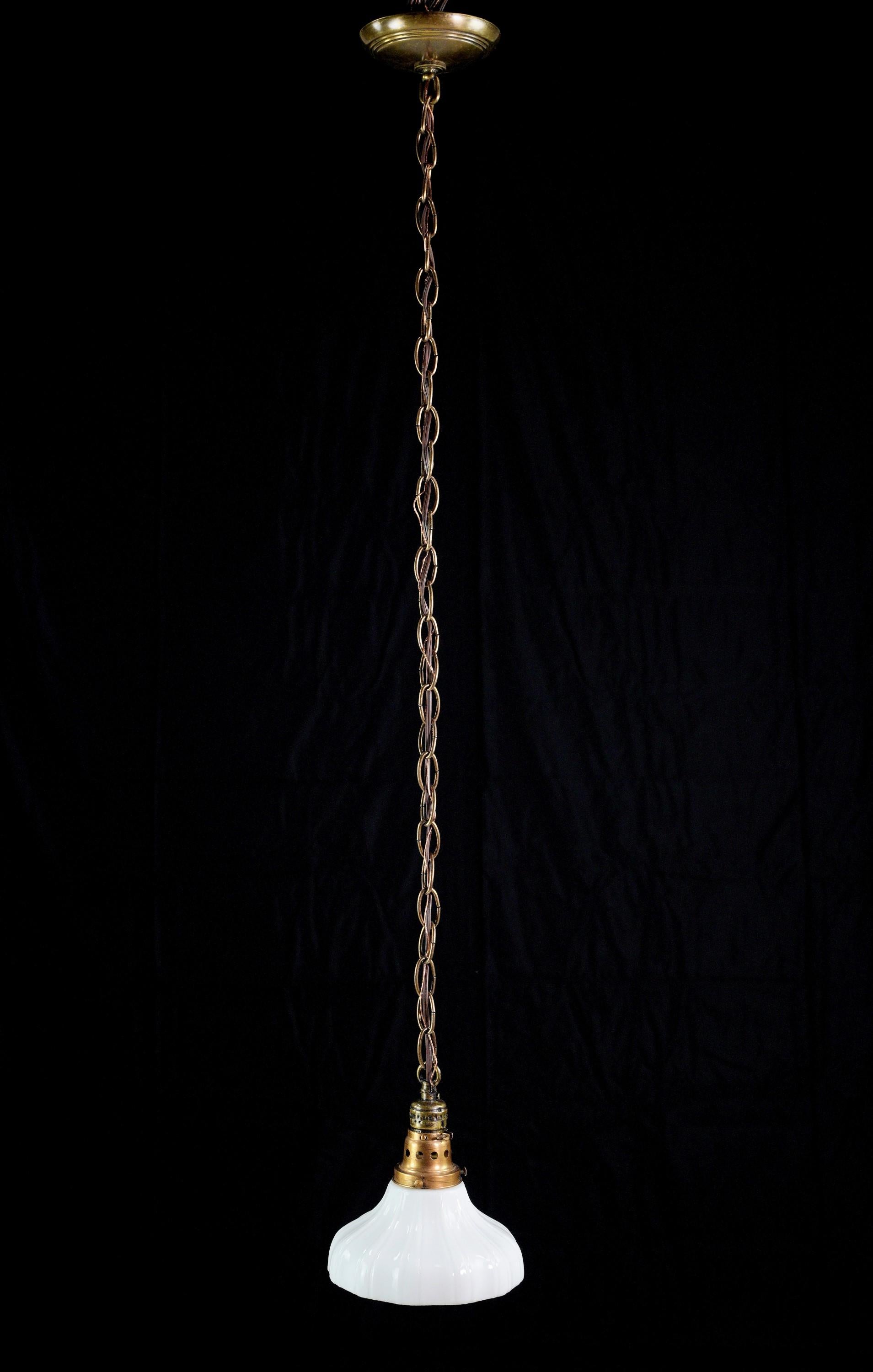 Antique white milk glass pendant light with a newly made brass fitter, canopy and steel chain. Cleaned and restored. This has one single standard medium base socket. Small quantity available at time of posting. Please inquire. Priced each. Please