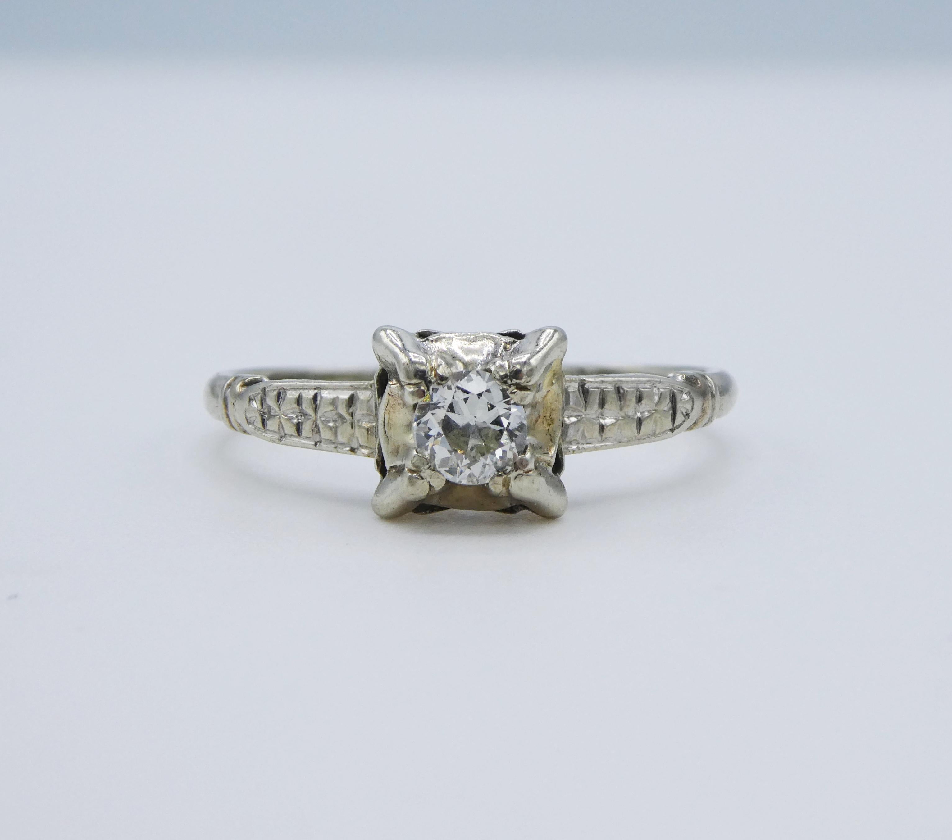 Antique Mine Cut Diamond 14K White Gold Estate Engagement Ring Size 7
Metal: 14k White 
Center Stone: approx. 0.25ct Mine Cut Diamonds color I-J clarity SI1
Weight: 1.40 grams
Finger Size: 7
Markings: Stamped 