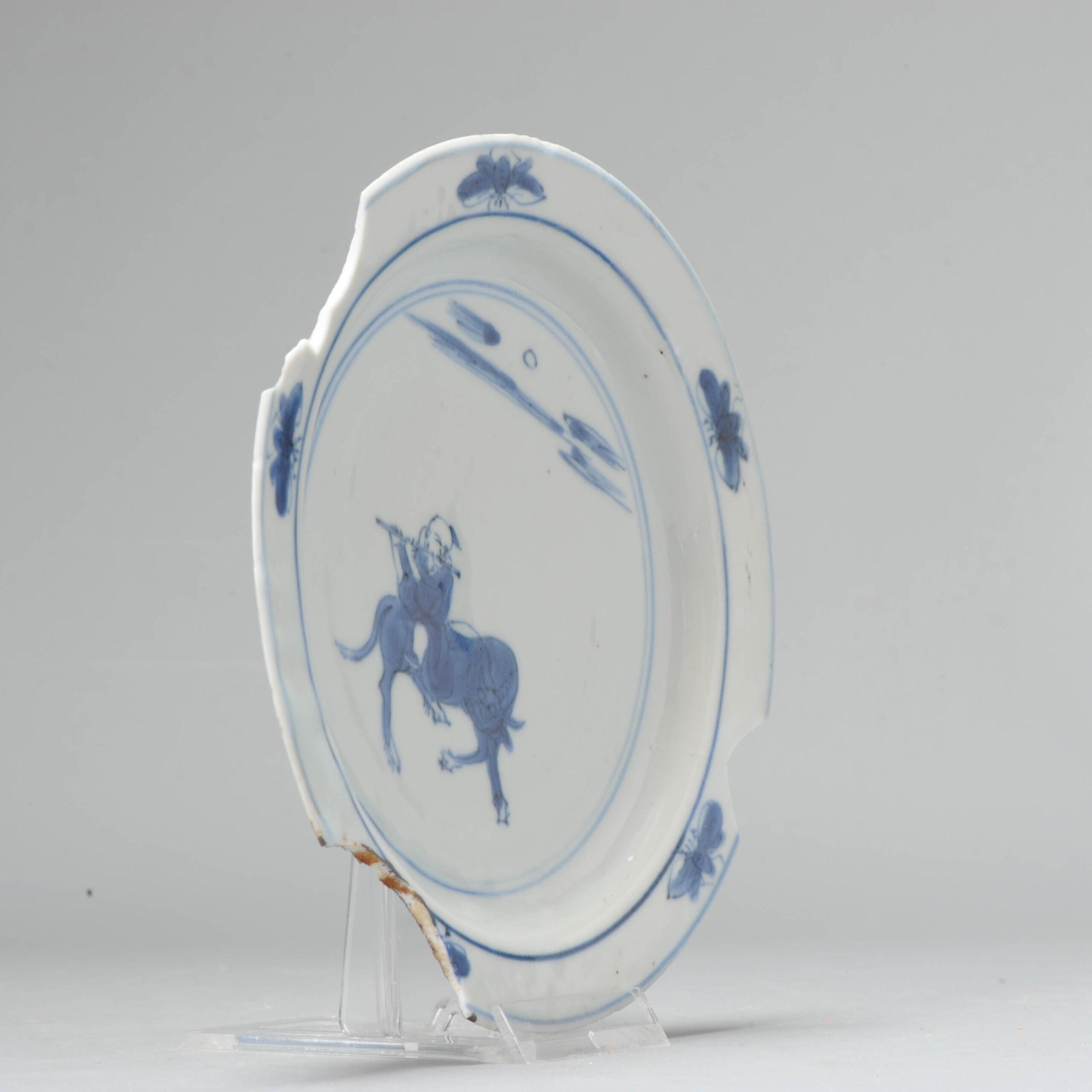 A very nice small dish from the Late ming period, Tianqi or Chongzhen. With a Boy riding an ox and playing the flute.

Ox herdboys riding oxen have been used as a motif in painting and graphic arts to symbolize the ability of the mind to control the