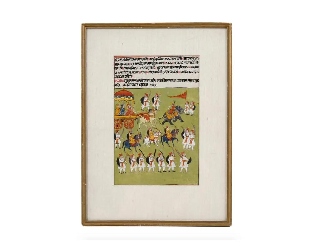 An antique miniature Indian Mughal Art gouache painting on antique manuscript leaf depicting a Royal military campaign scene in bold colors and with fine details. Carefully written with a Hindi calligraphic text upper to the center. Framed. Circa: