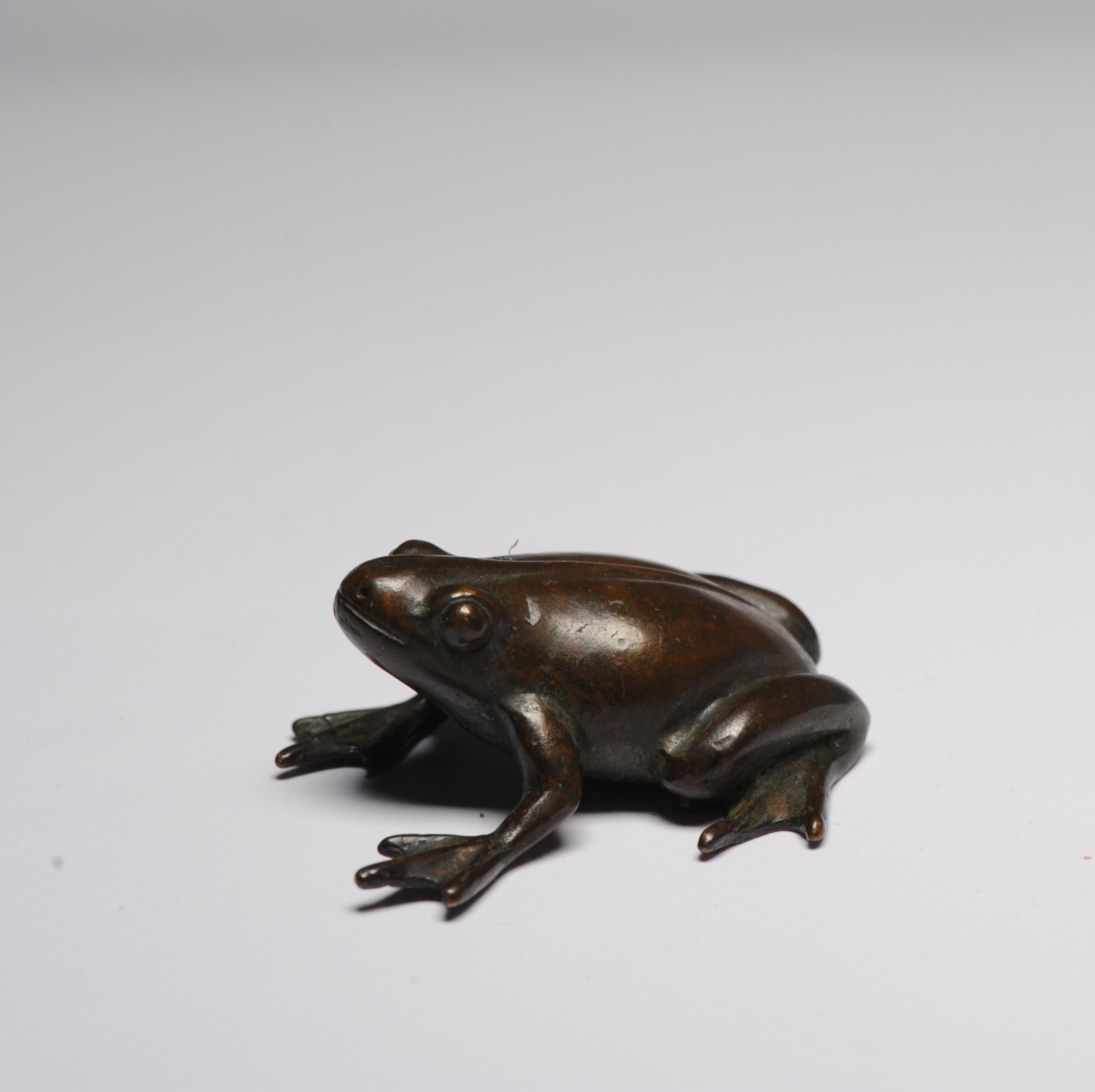 Nicely made artifact used as table decoration during the kaiseki meal. The piece is marked at the belly.

A fine genuinely antique Japanese hand-wrought and hand cast copper frog Okimono sculpture. Very fine condition. Today these older works of