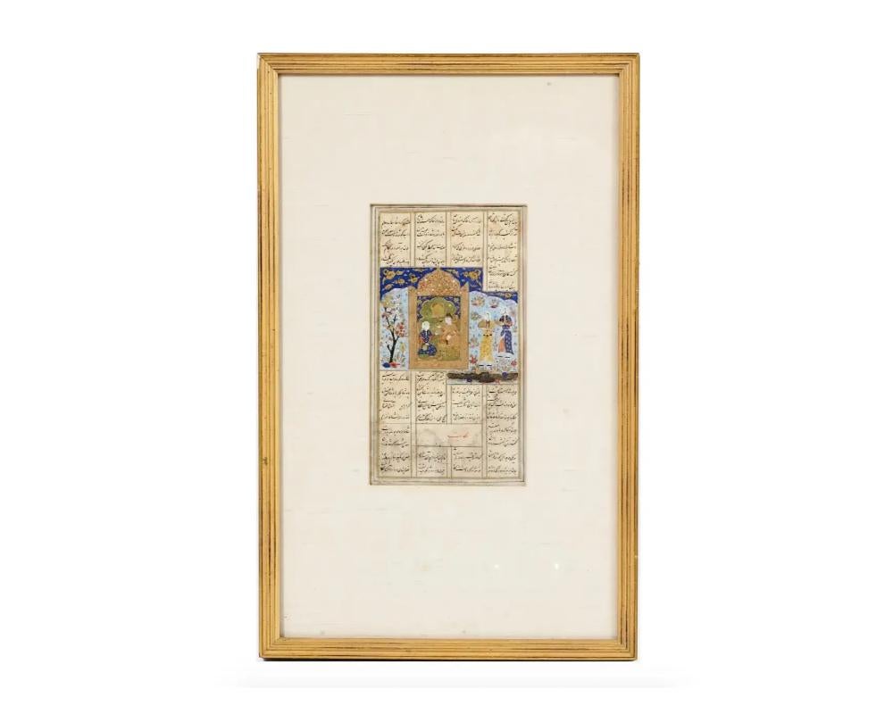 An antique miniature Indo Persian Mughal Art gouache painting on antique manuscript leaf depicting a Royal court scene in a blossoming garden with trees and birds in bold colors and with fine details. Carefully written with an Arabic calligraphic