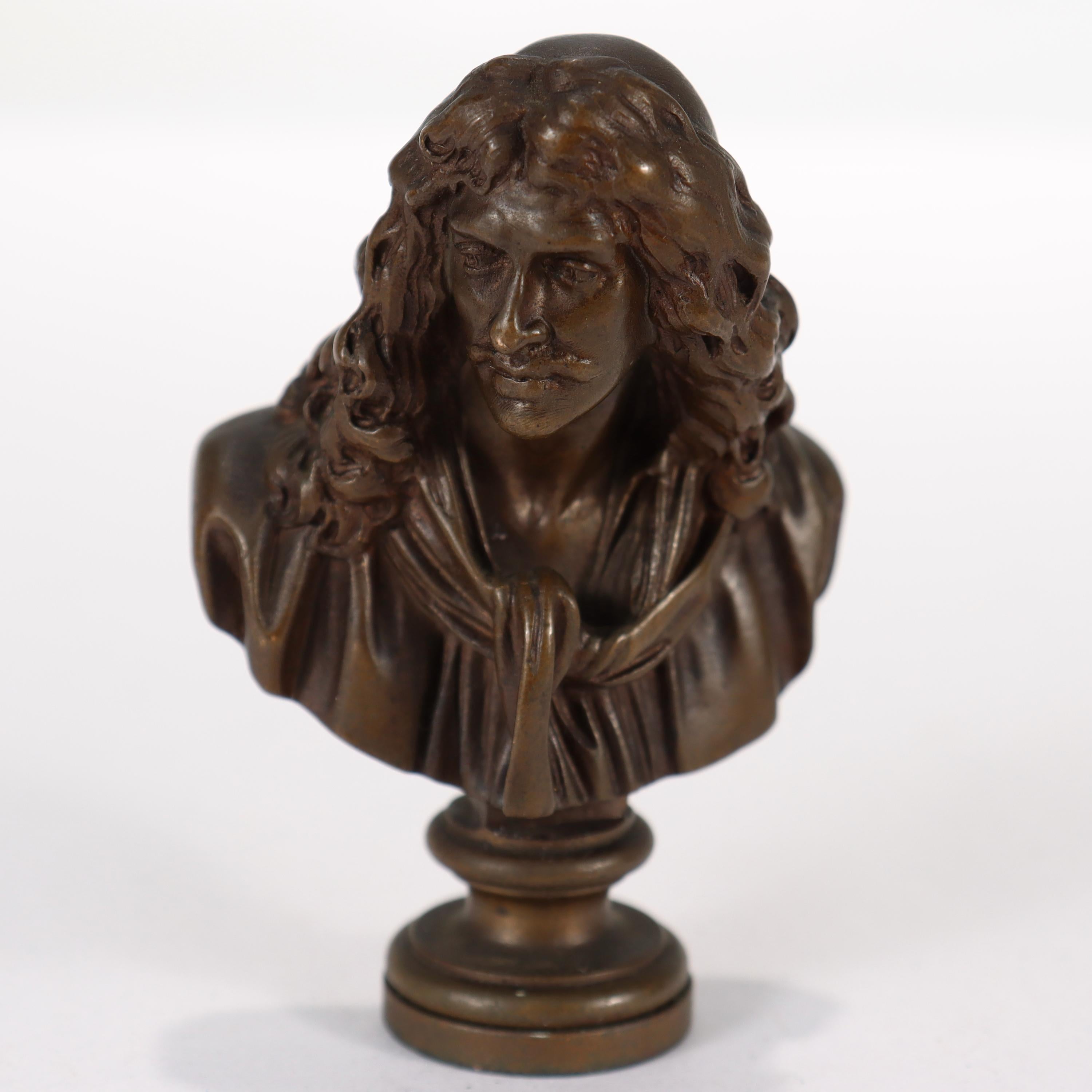 A fine antique miniature bronze.

A miniature portrait bust of Molière, the alias of the playwright Jean Baptiste Poquelin.

Modeled after the original by Jean-Antoine Houdon.

Cast by F. Barbedienne.

Simply a wonderful cabinet-sized