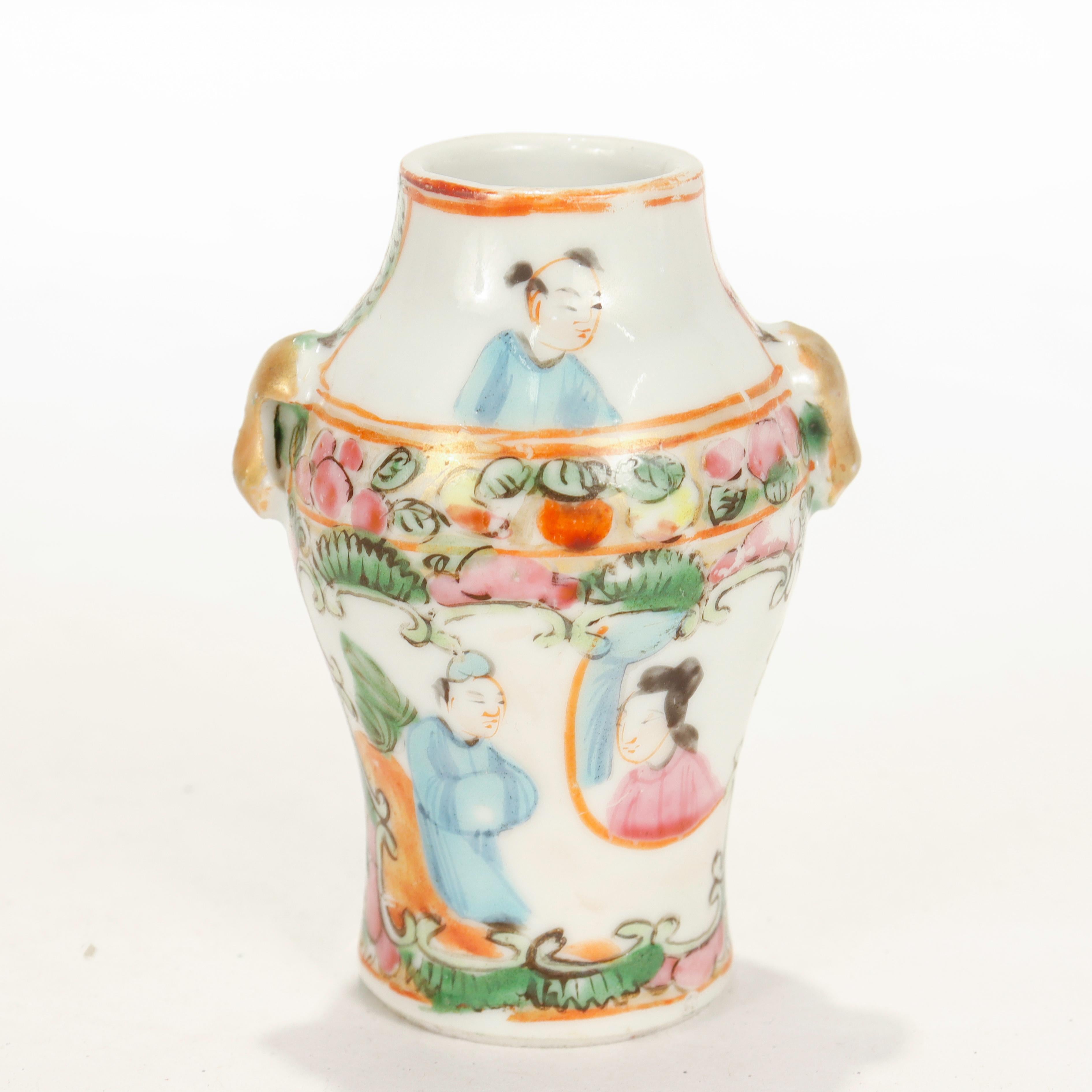 An antique Chinese porcelain vase.

In the Rose Medallion style.

With two small gilt handles.

Simply a wonderful Chinese Export Rose Medallion porcelain vase!

Date:
Late 19th or Early 20th Century

Overall Condition:
It is in overall