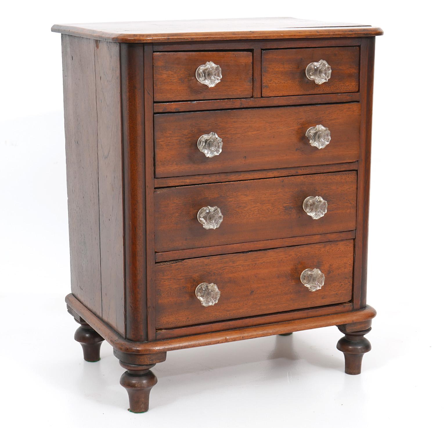 Antique Miniature Commode. English, Mahogany, circa 1850's in a Sheraton Style with glass knobs. 12