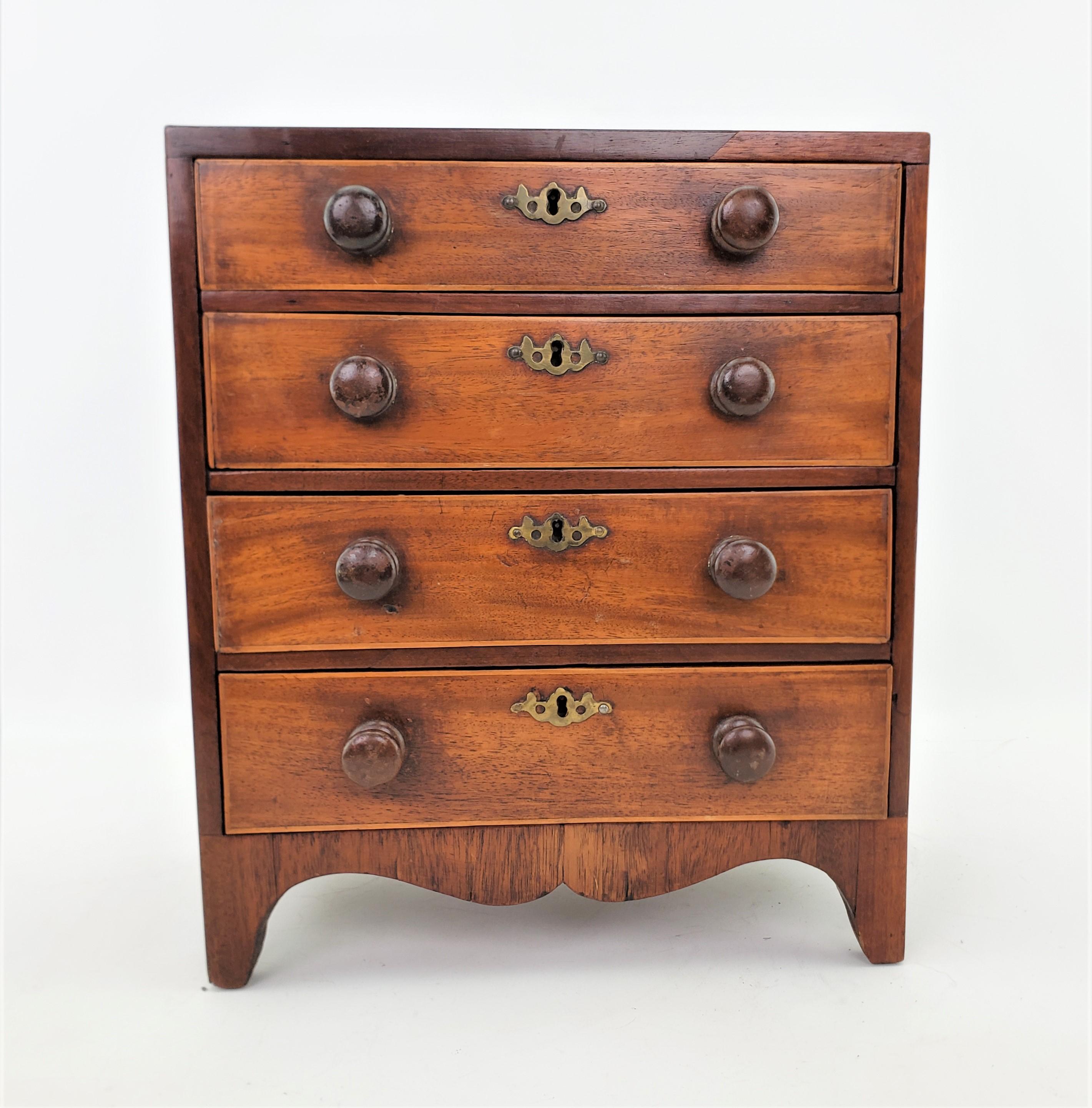 antique four drawer chest of drawers