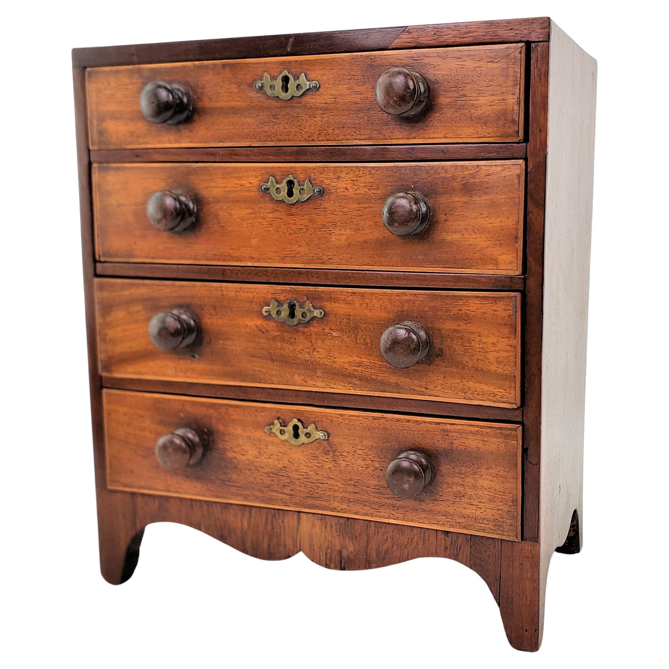 Antique Miniature Four Drawer Tall Boy Dresser with Turned Knobs & Brass Locks For Sale
