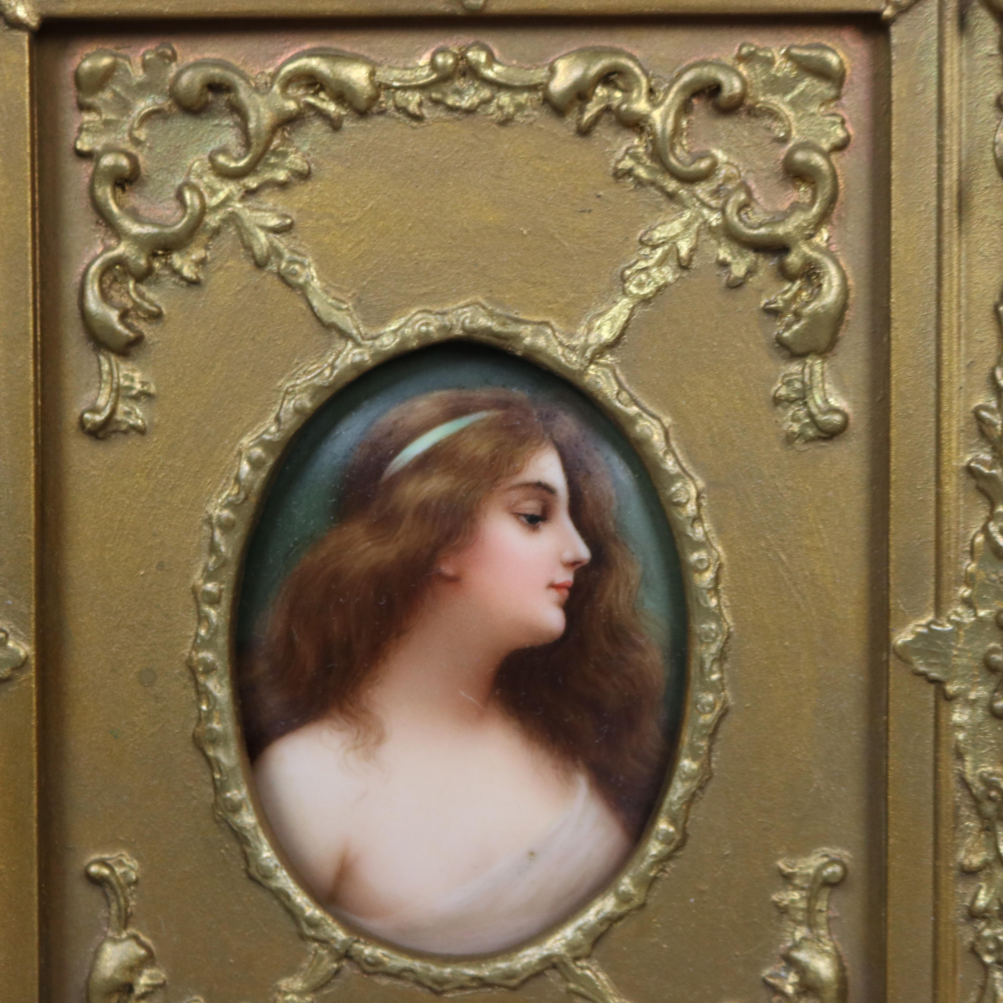 An antique miniature offers hand painted porcelain portrait of a woman, seated in giltwood frame, circa 1890

Measures - 9