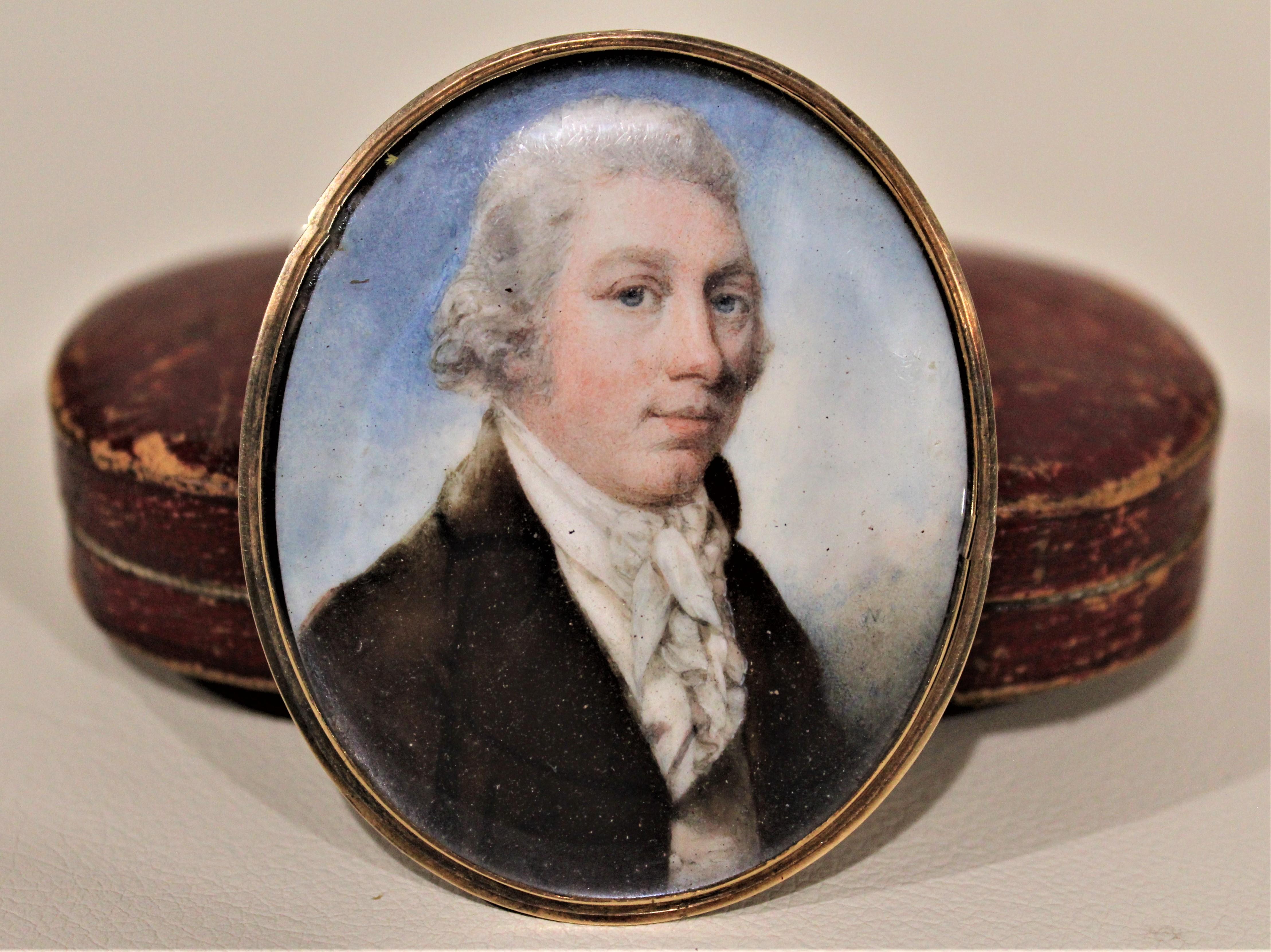 Dating from the late 17th century and done in the Federalist style, this finely detailed and well executed hand painted miniature portrait on bone of a period nobleman can be worn as a brooch, or displayed as a painting. The back is unmarked, but