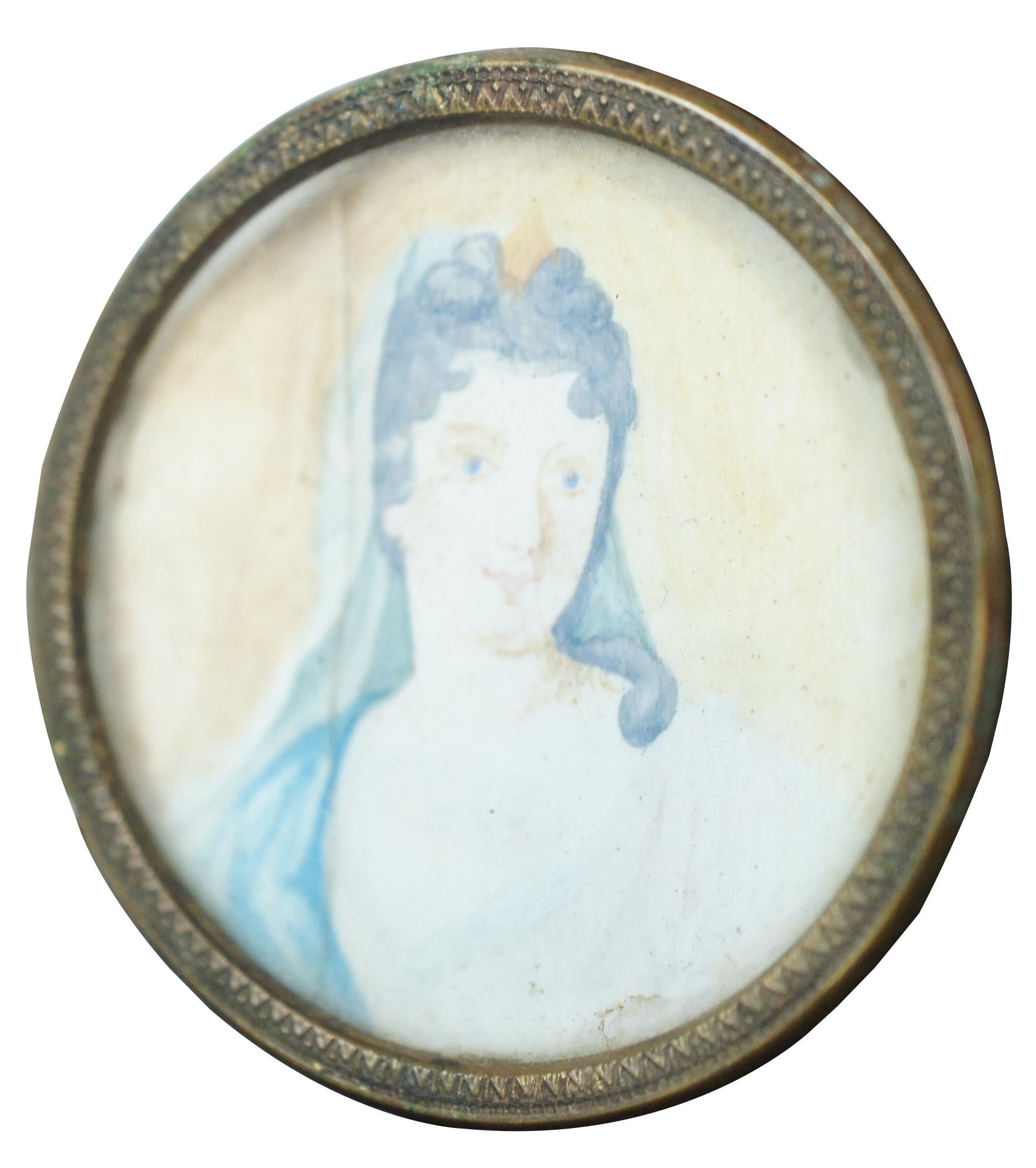 Antique miniature watercolor portrait of a woman in a neoclassical style, set without glass in a brass frame.

Measures: 1.875” x 0.125” x 1.875” / Sans Frame - 1.625” x 1.625” (Width x Depth x Height).