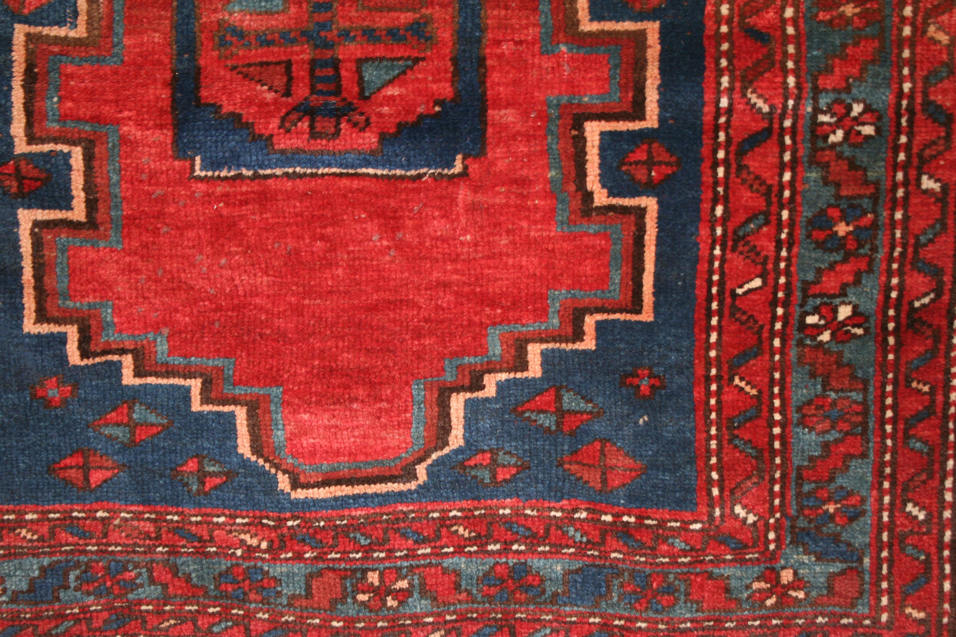 An exquisite antique southwest Caucasian rug, belonging to the prestigious family of weavings known as Kazak. These are characteristically distinguished by abstract geometric patterns originating from the ancient iconography of the Armenian people,
