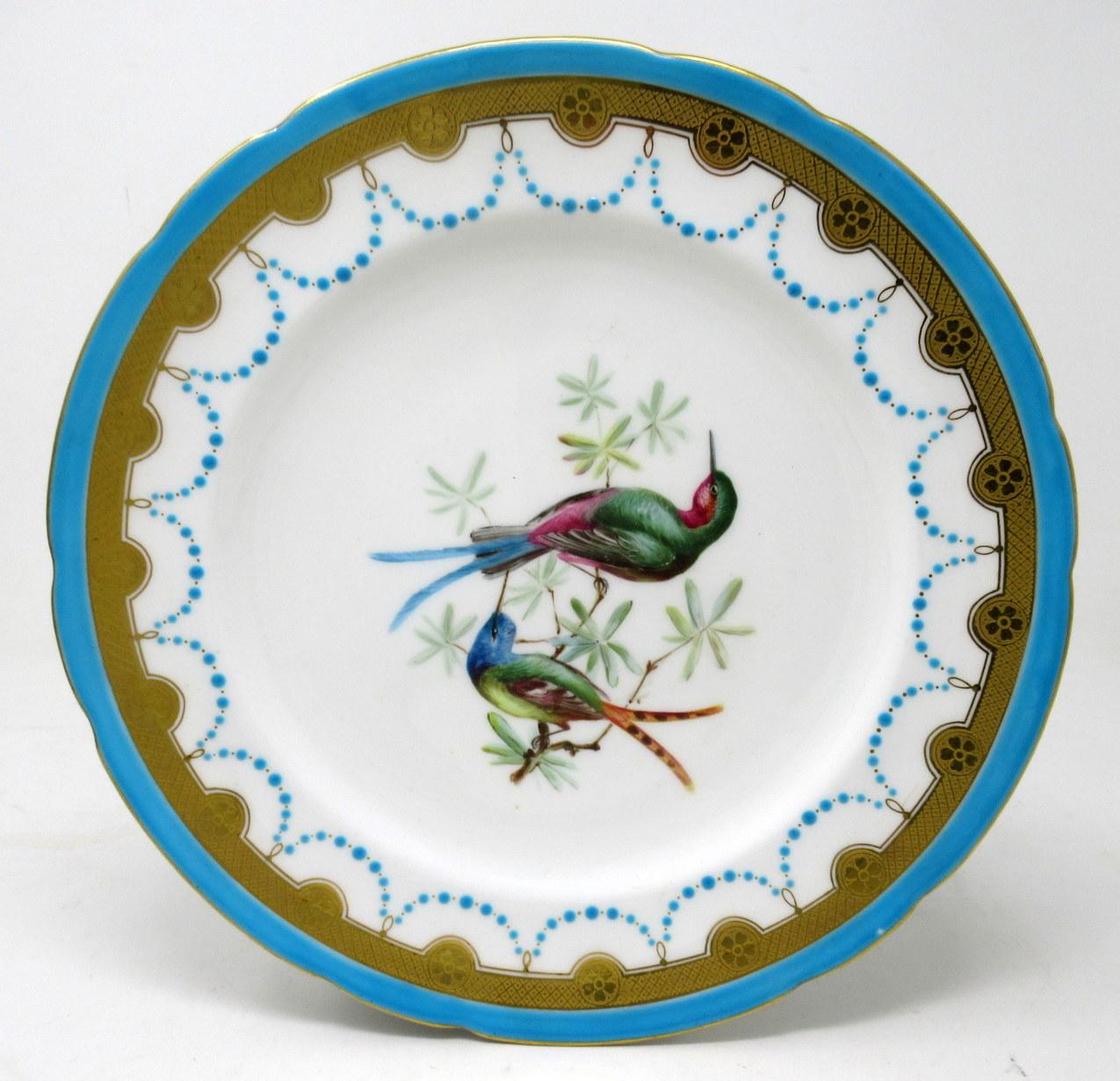 Stunning Example of an English Minton Porcelain hand painted cabinet plate of circular form of outstanding quality. 

The central reserve exquisitely hand painted depicting two colourful exotic Birds perched in branches, within a turquoise blue
