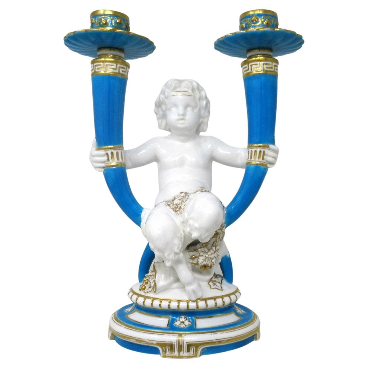 Ancien candélabre en porcelaine de Minton Staffordshire représentant un chérubin, 19ème siècle   en vente